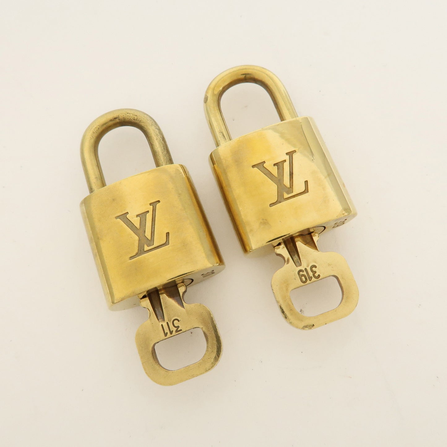 Louis Vuitton Set of 10 Lock & Key Cadena Key Lock Gold