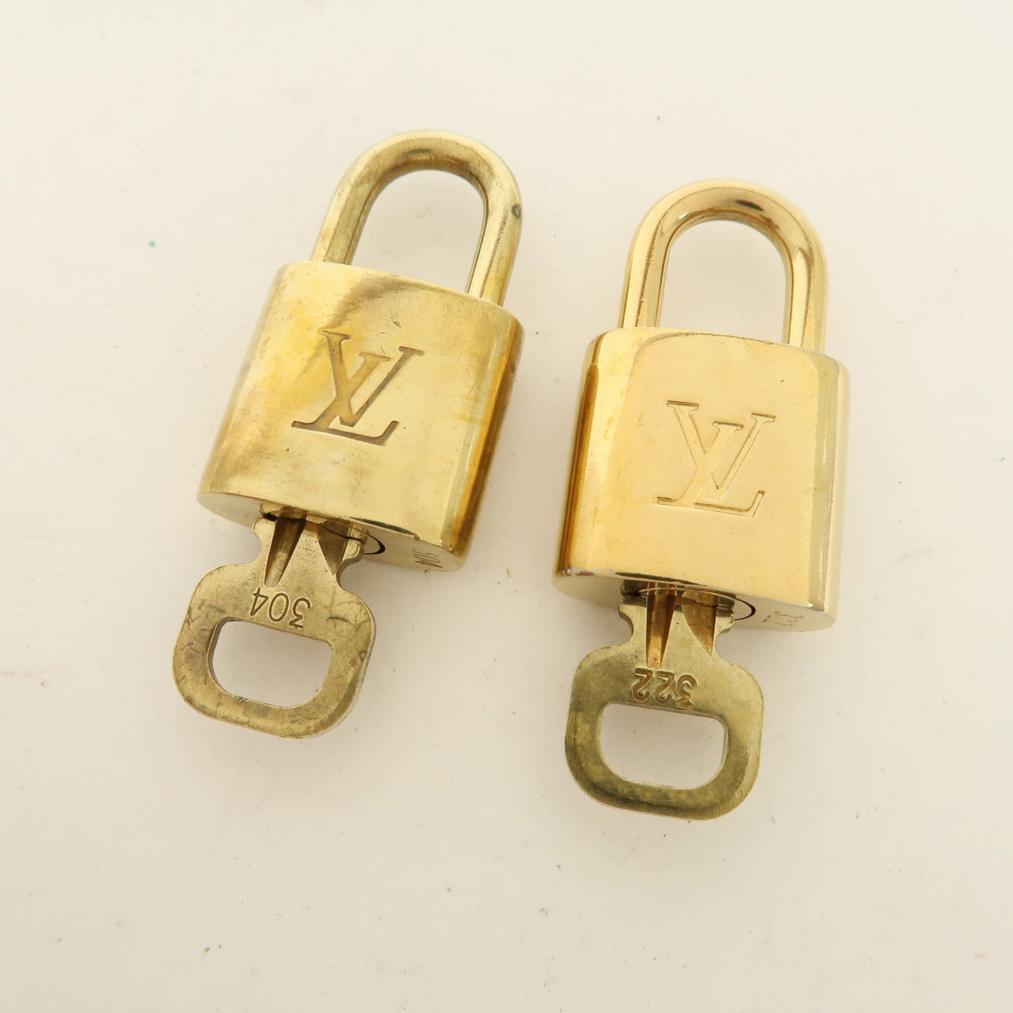 Louis Vuitton Set of 10 Lock & Key Cadena Key Lock Gold