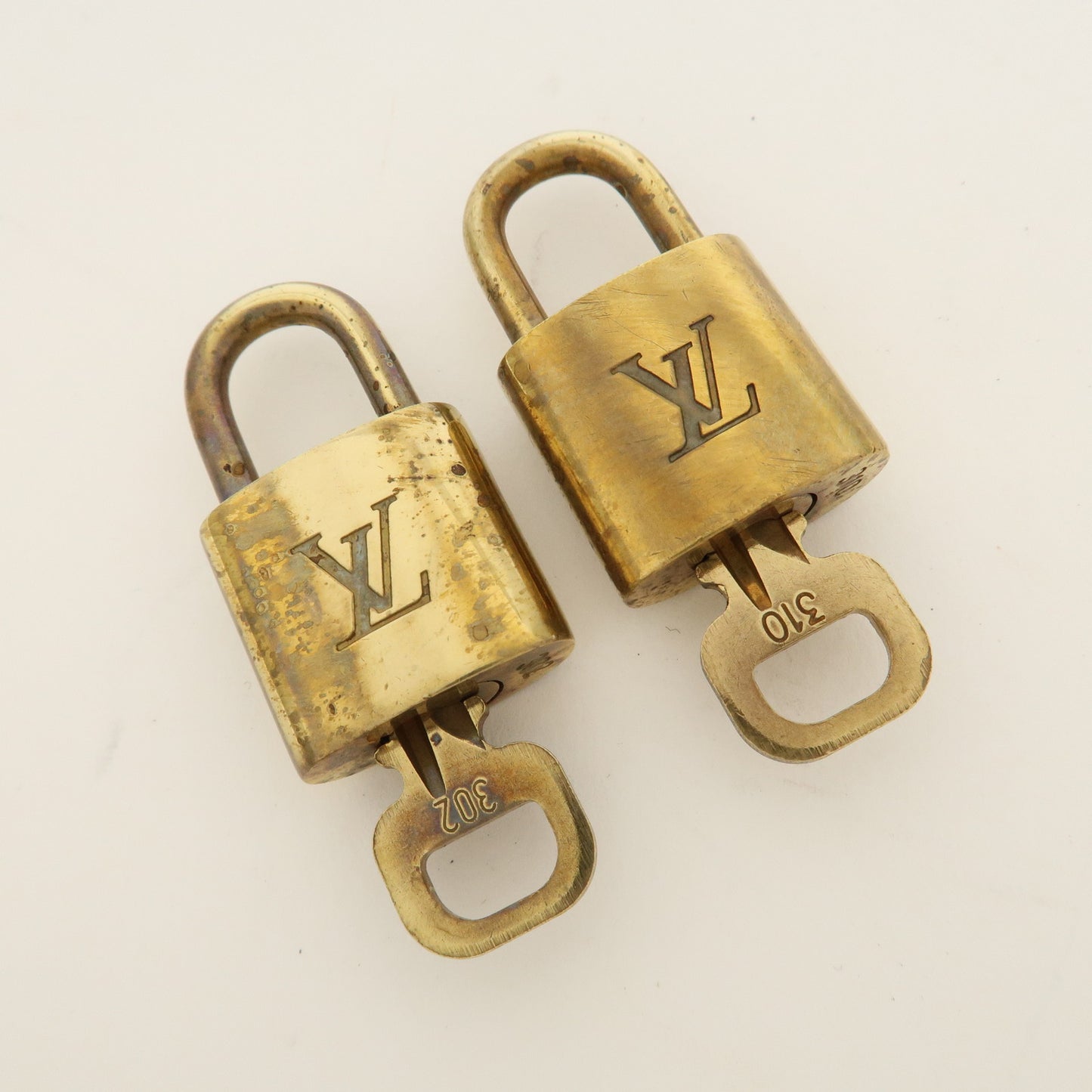 Louis Vuitton Set of 10 Lock & Key Cadena Key Lock Gold