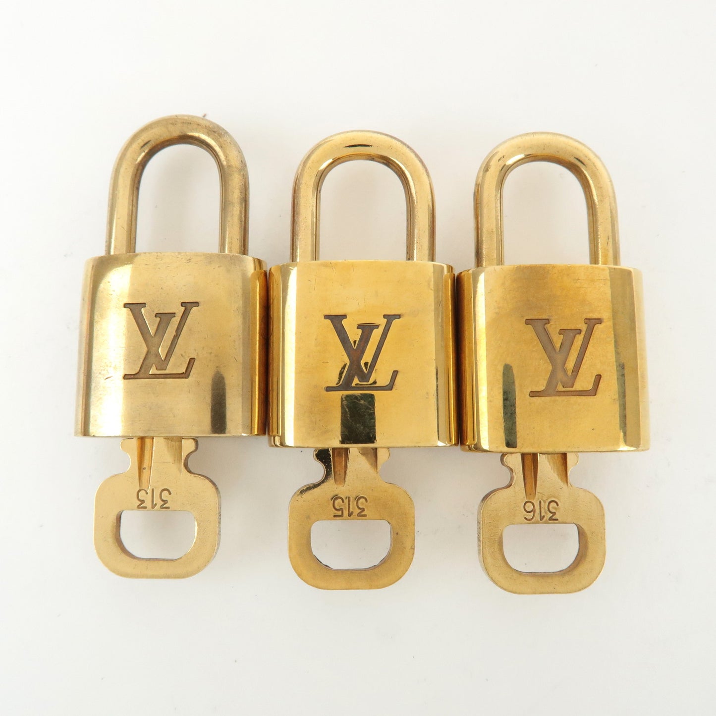 Louis Vuitton Set of 10 Lock & Key Cadena Key Lock Gold