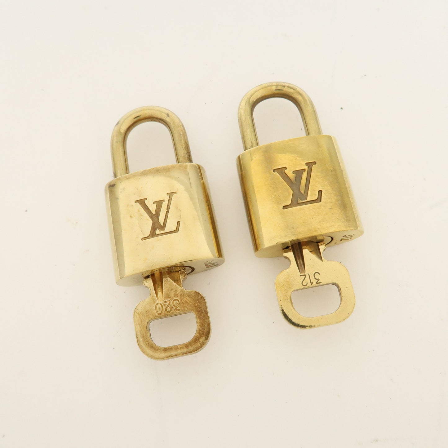 Louis Vuitton Set of 10 Lock & Key Cadena Key Lock Gold