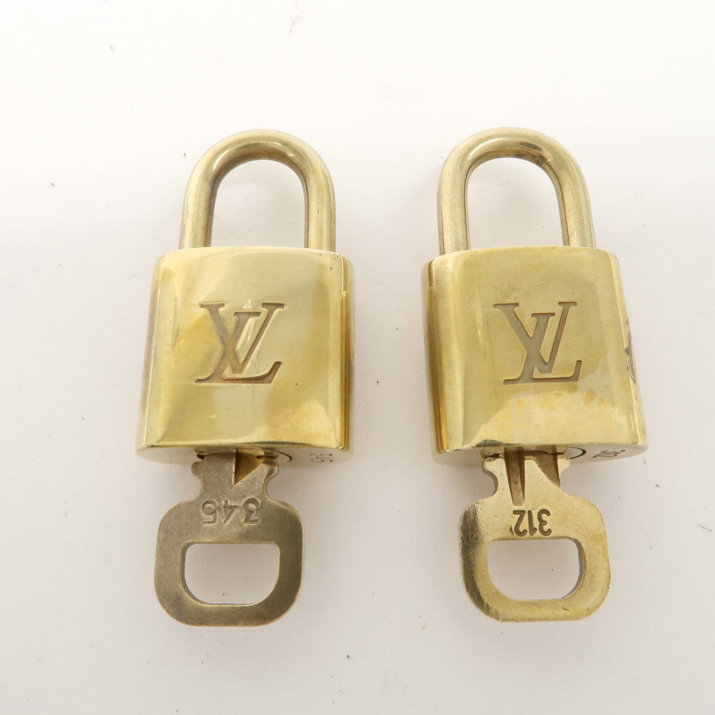 Louis Vuitton Set of 10 Lock & Key Cadena Key Lock Gold