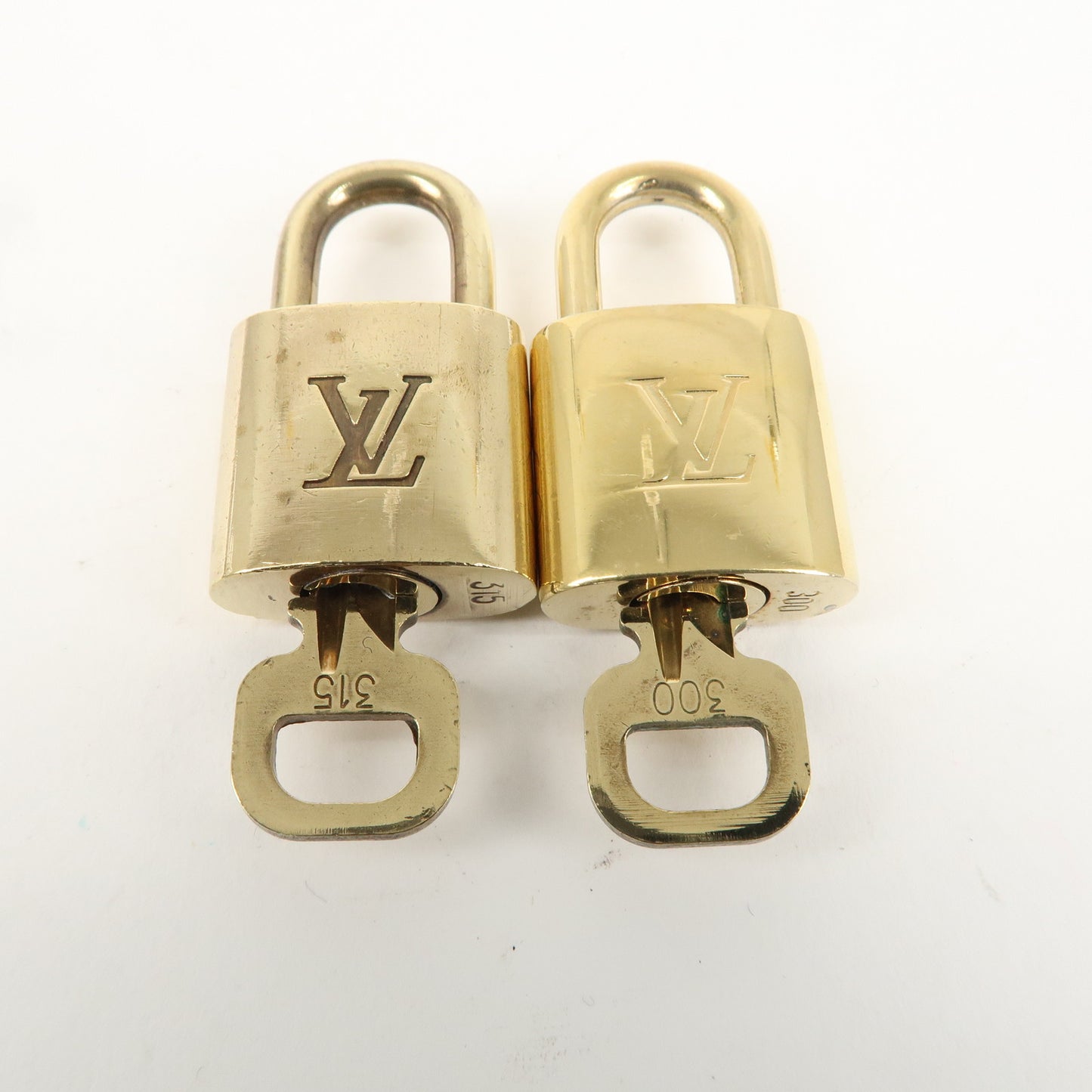 Louis Vuitton Set of 10 Lock & Key Cadena Key Lock Gold