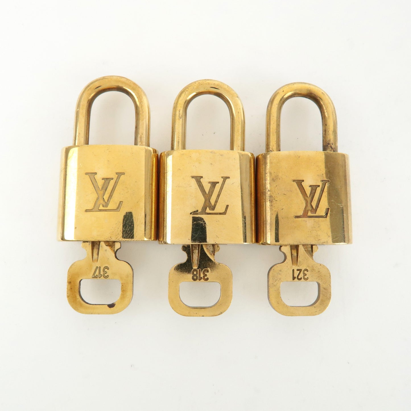 Louis Vuitton Set of 10 Lock & Key Cadena Key Lock Gold