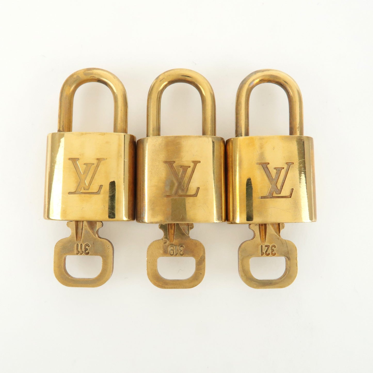 Louis Vuitton Set of 10 Lock & Key Cadena Key Lock Gold