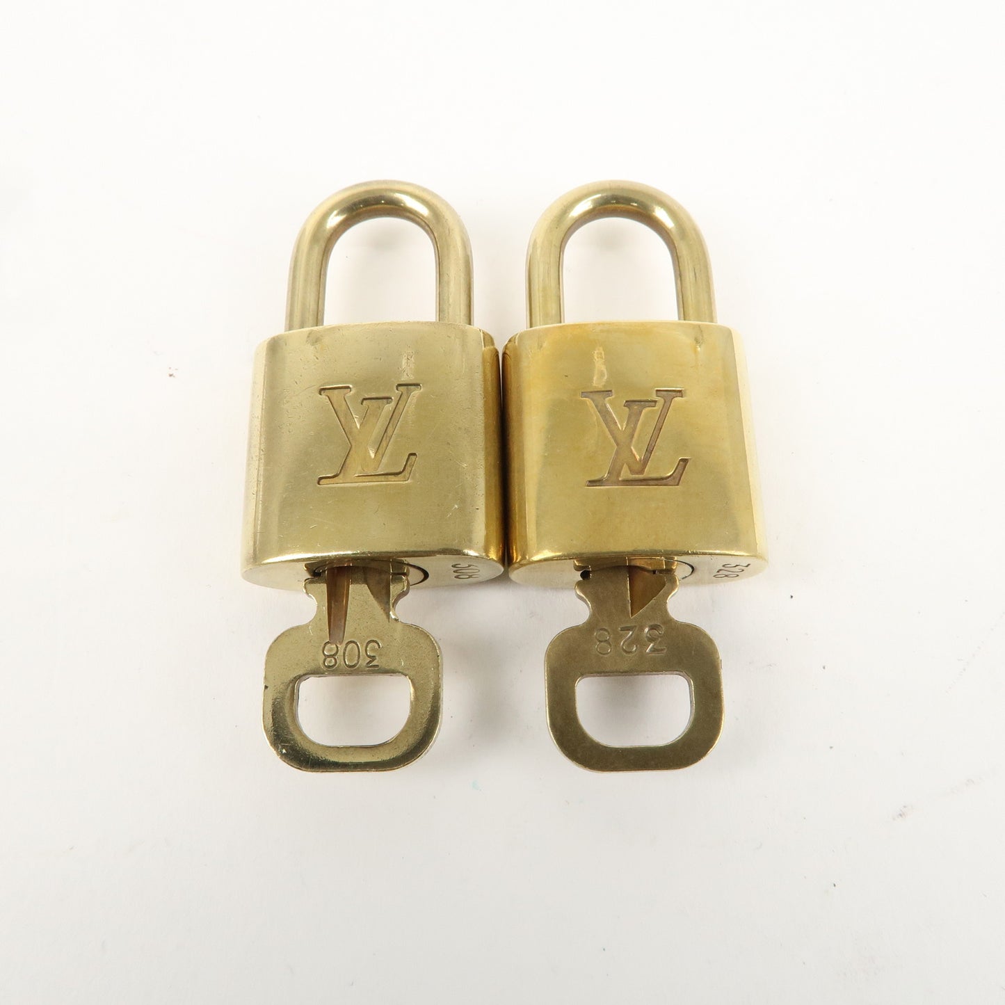 Louis Vuitton Set of 10 Lock & Key Cadena Key Lock Gold