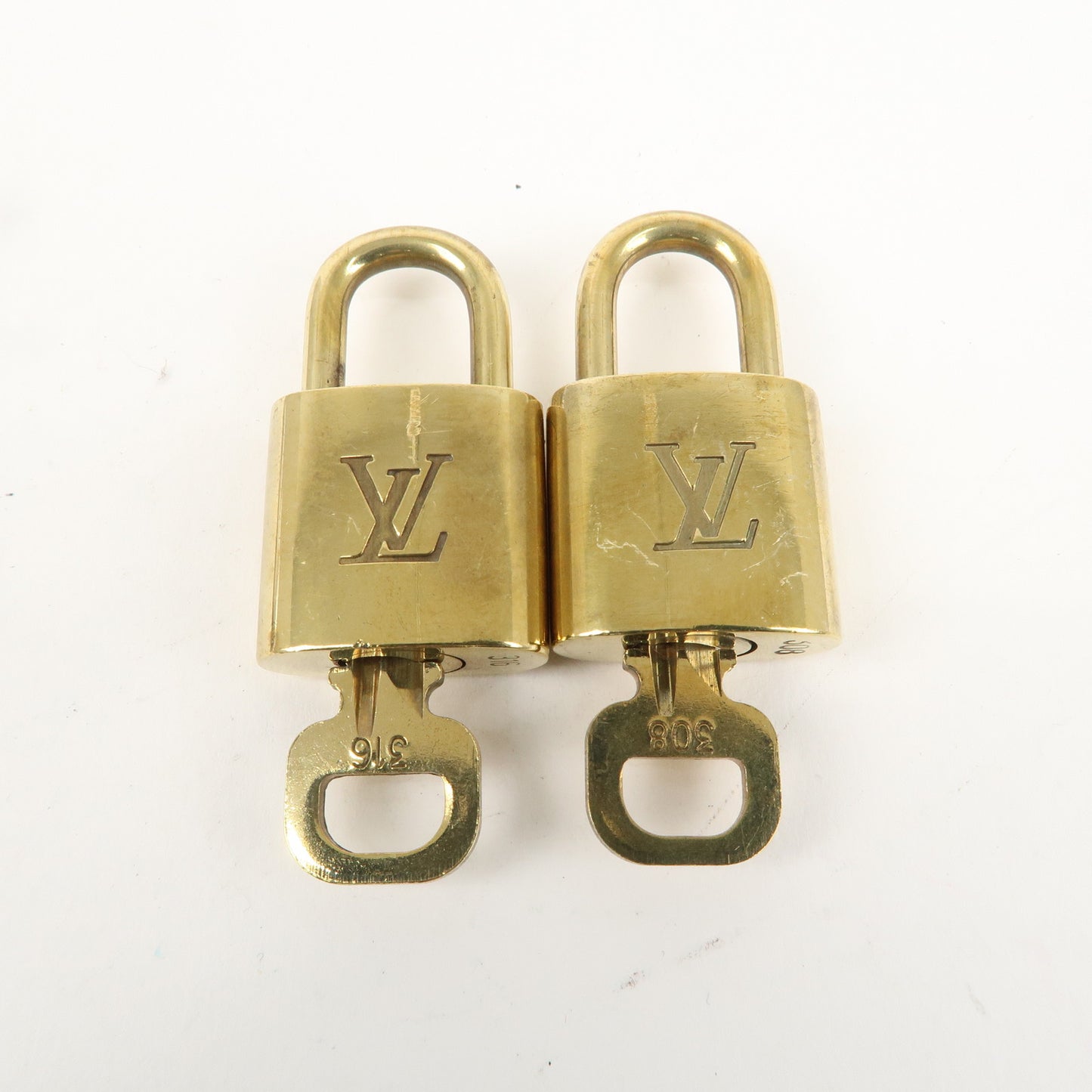 Louis Vuitton Set of 10 Lock & Key Cadena Key Lock Gold