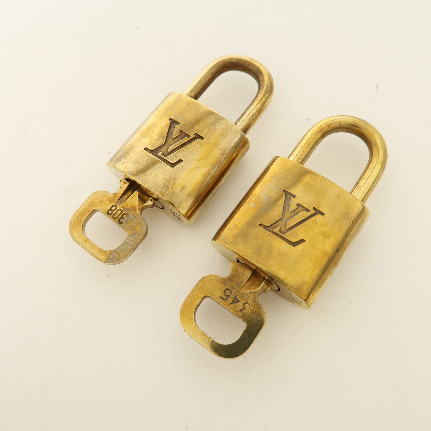 Louis Vuitton Set of 10 Lock & Key Cadena Key Lock Gold