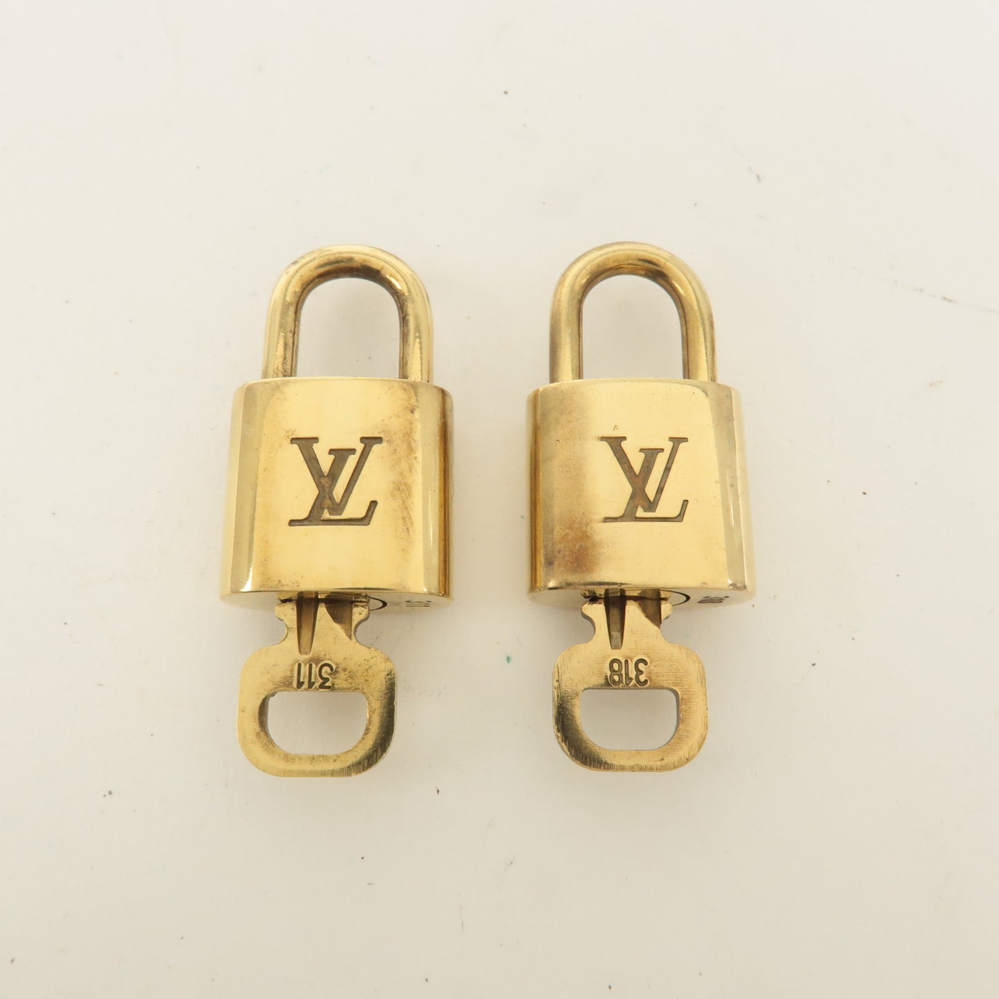 Louis Vuitton Set of 10 Lock & Key Cadena Key Lock Gold