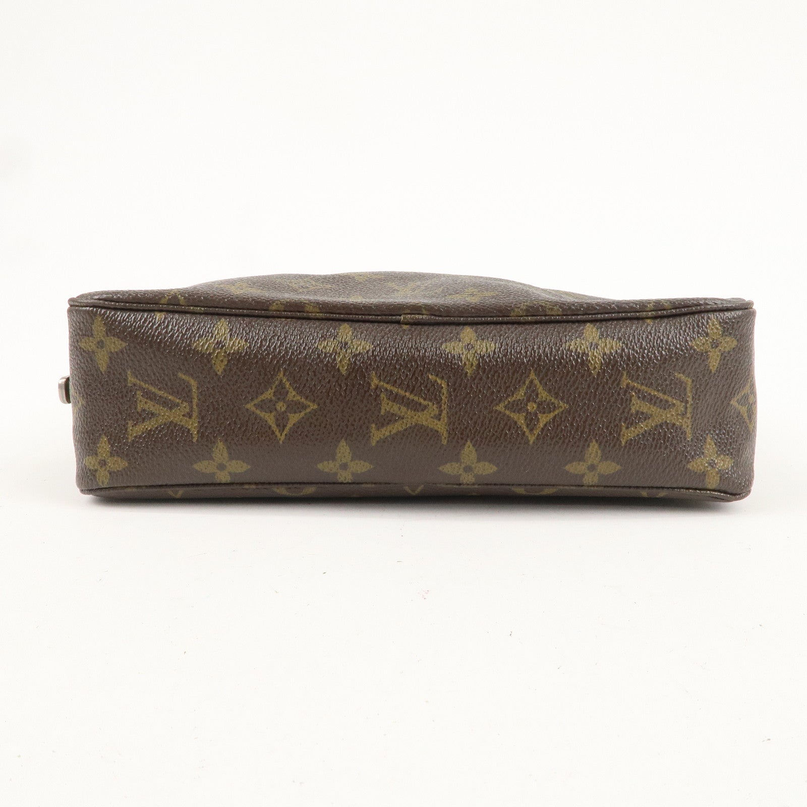 is Vuitton Monogram Trousse Toilette 23 Cosmetic Pouch M47524