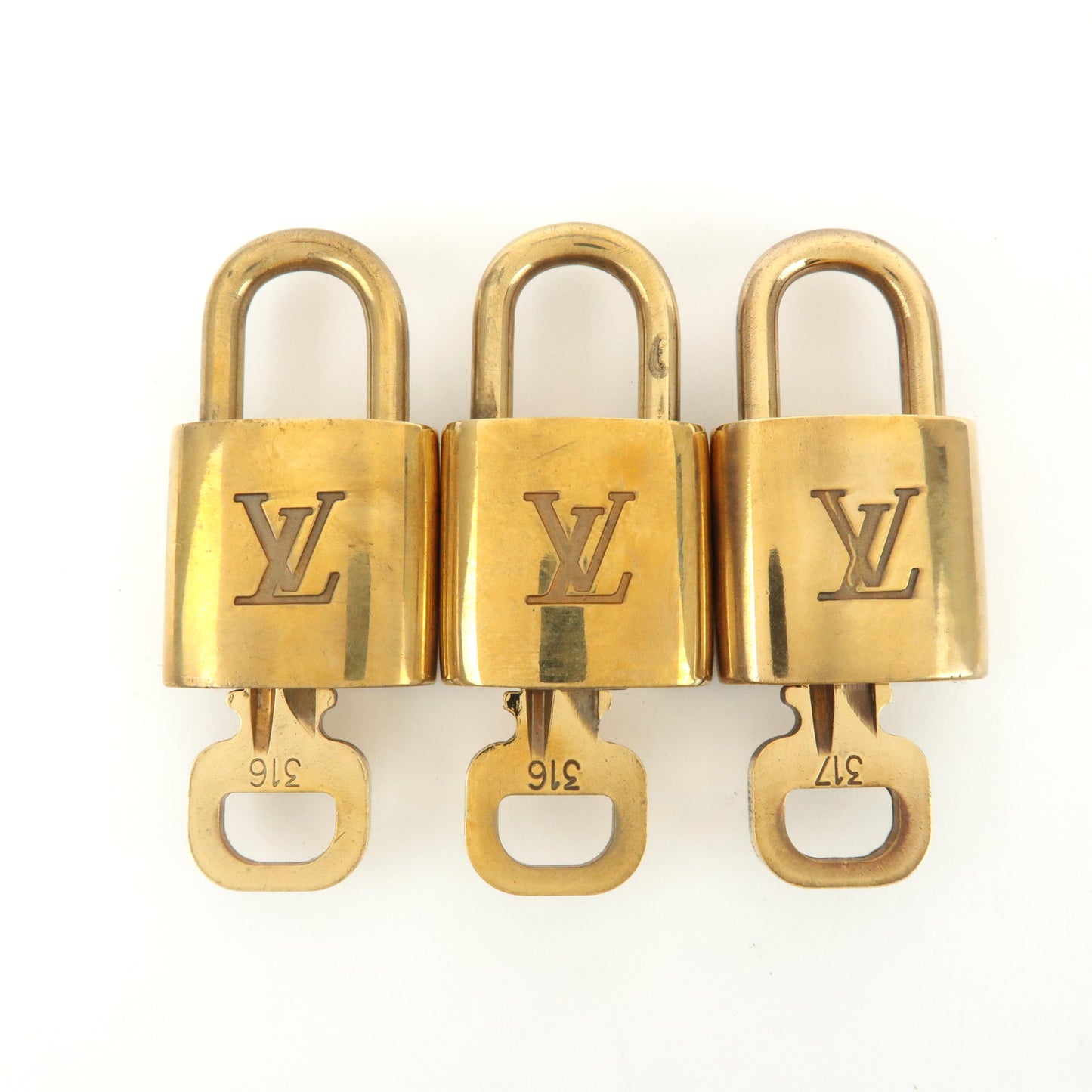 Louis Vuitton Set of 10 Lock & Key Cadena Key Lock Gold