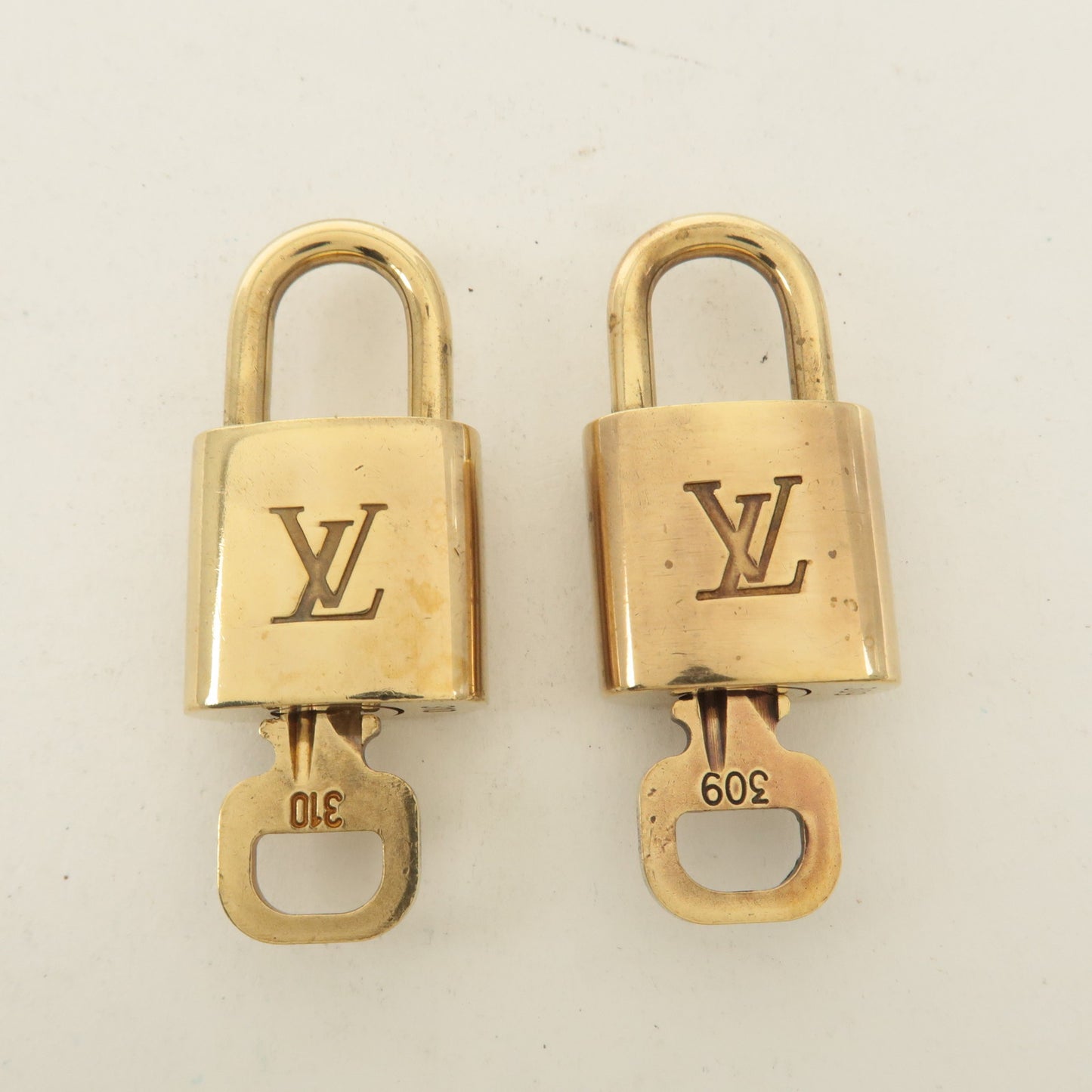 Louis Vuitton Set of 10 Lock & Key Cadena Key Lock Gold