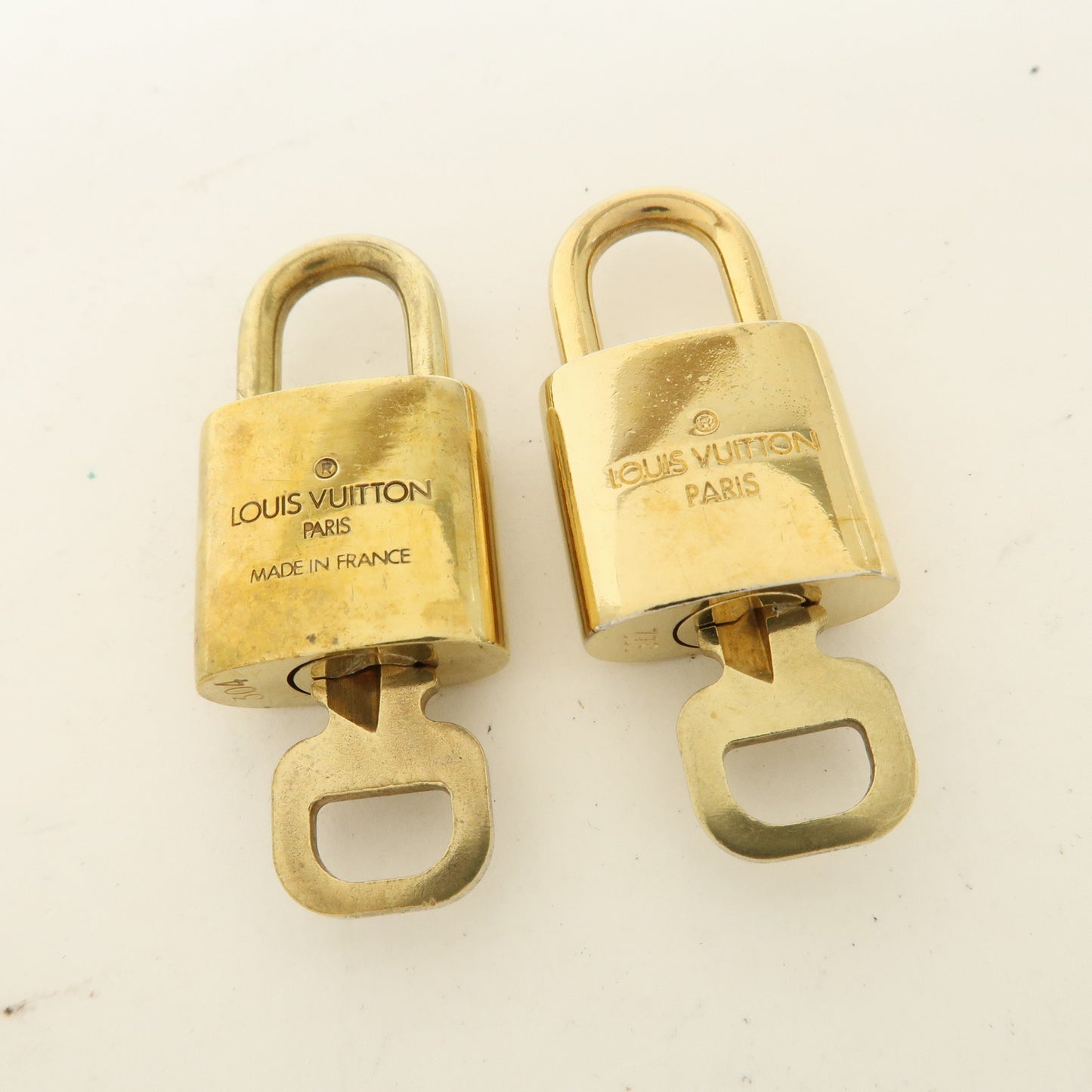 Louis Vuitton Set of 10 Lock & Key Cadena Key Lock Gold