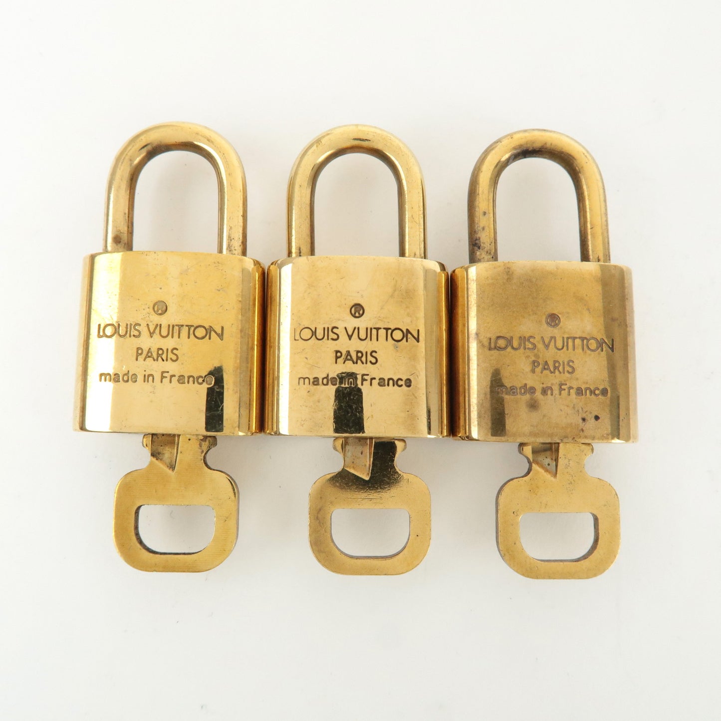 Louis Vuitton Set of 10 Lock & Key Cadena Key Lock Gold