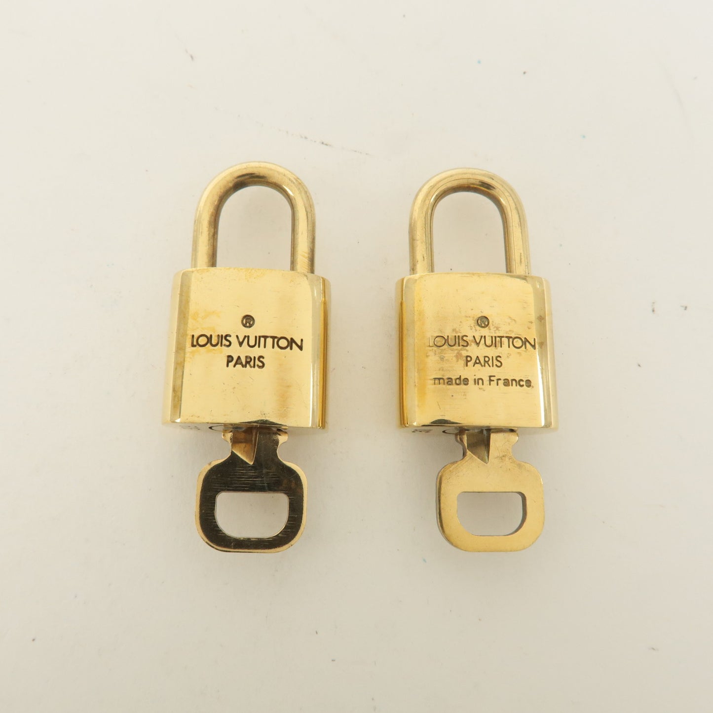 Louis Vuitton Set of 10 Lock & Key Cadena Key Lock Gold