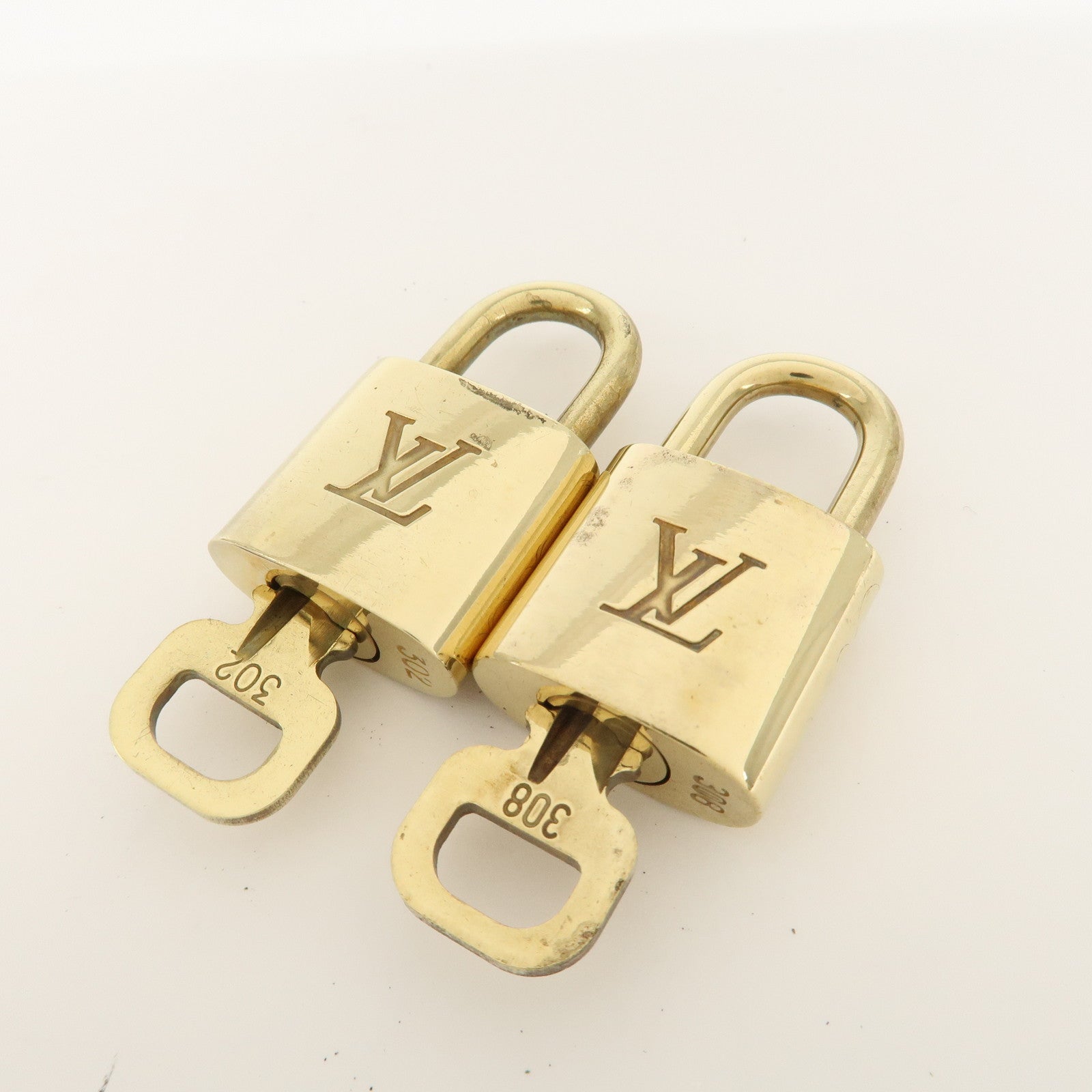 Louis Vuitton Set of 10 Lock & Key Cadena Key Lock Metal Gold