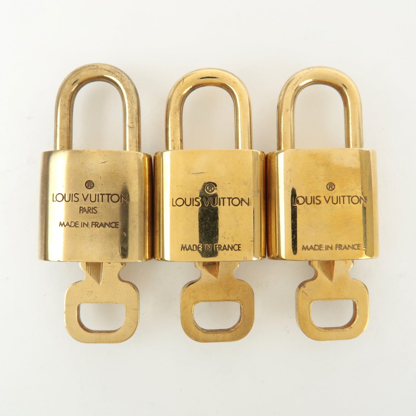 Louis Vuitton Set of 10 Lock & Key Cadena Key Lock Gold