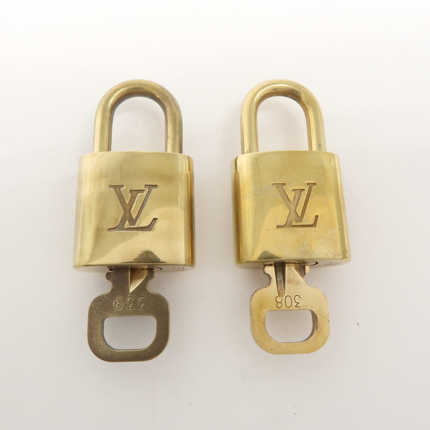 Louis Vuitton Set of 10 Lock & Key Cadena Key Lock Gold