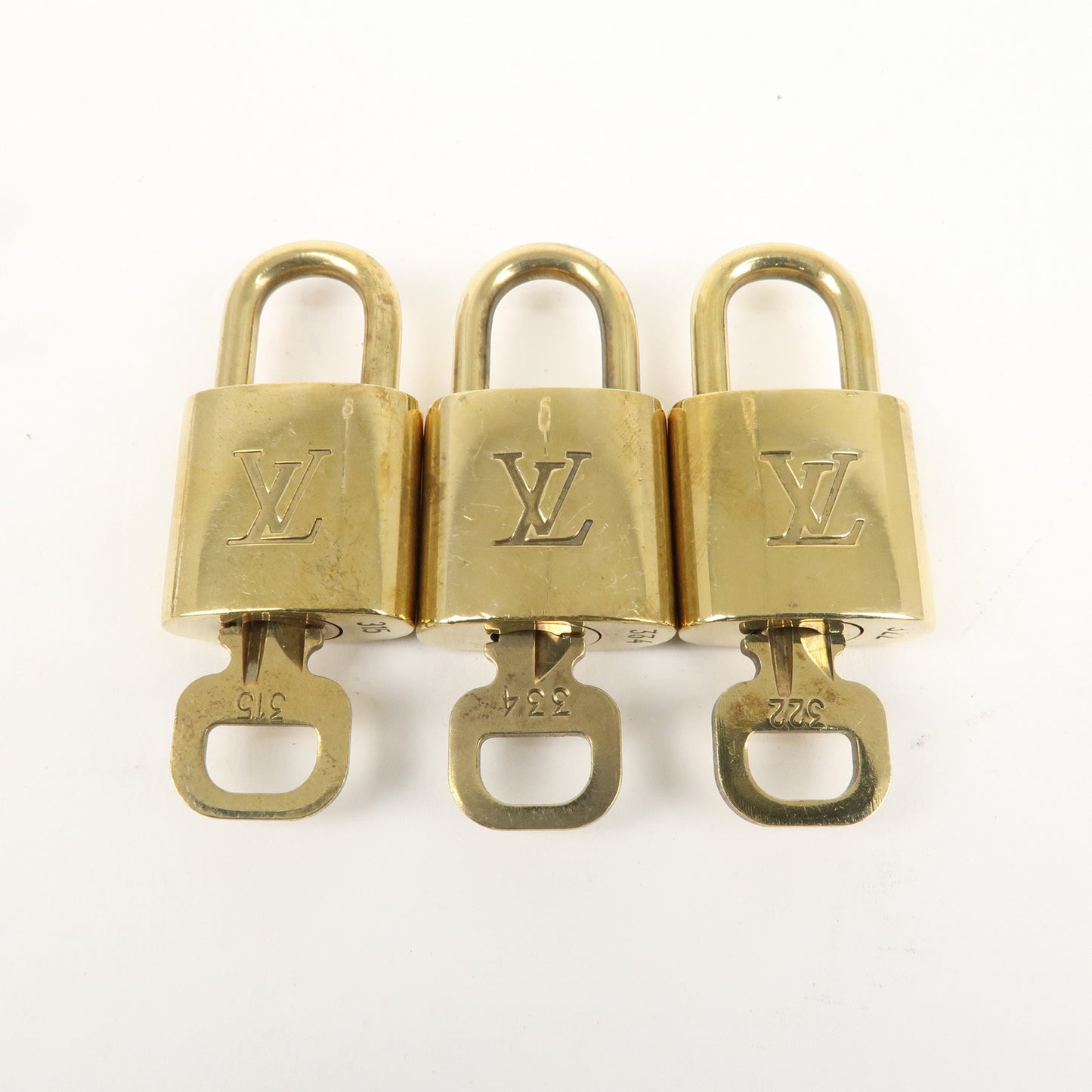 Louis Vuitton Set of 10 Lock & Key Cadena Key Lock Gold