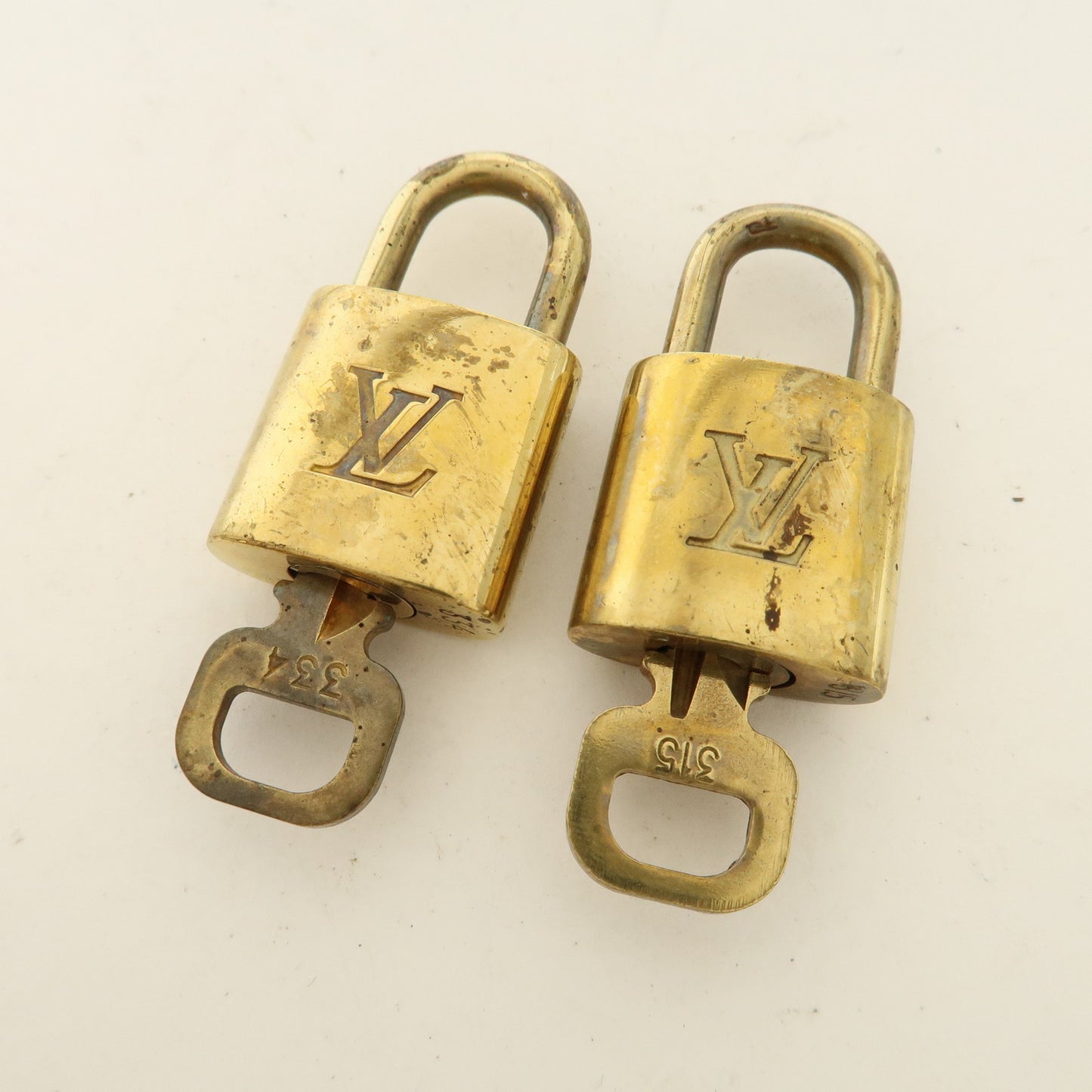 Louis Vuitton Set of 10 Lock & Key Cadena Key Lock Gold