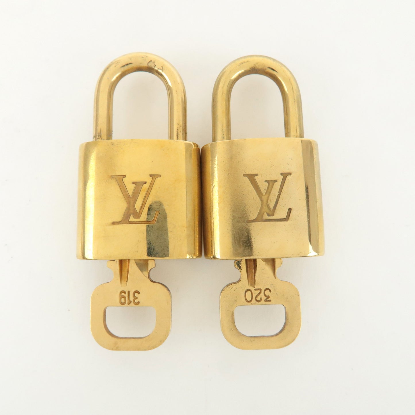 Louis Vuitton Set of 10 Lock & Key Cadena Key Lock Gold