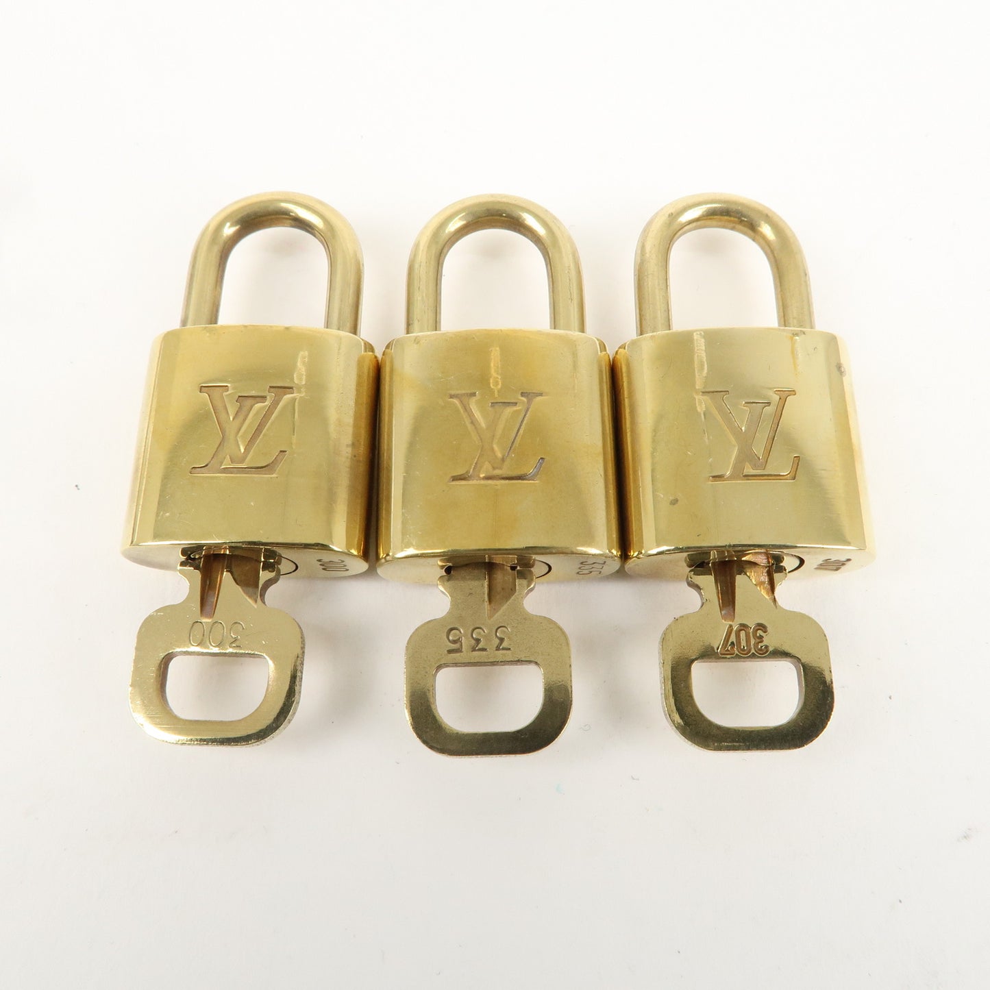 Louis Vuitton Set of 10 Lock & Key Cadena Key Lock Gold