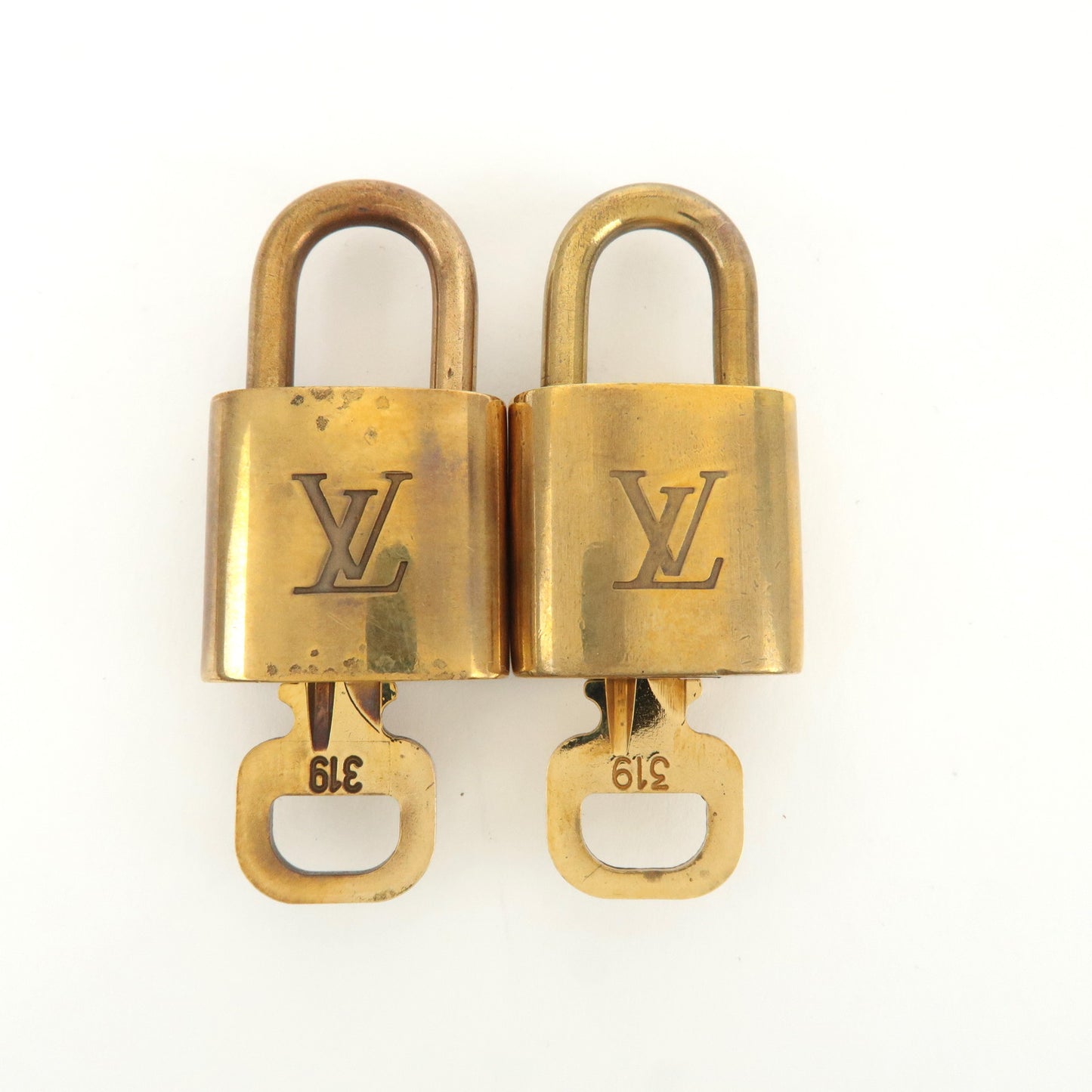 Louis Vuitton Set of 10 Lock & Key Cadena Key Lock Gold