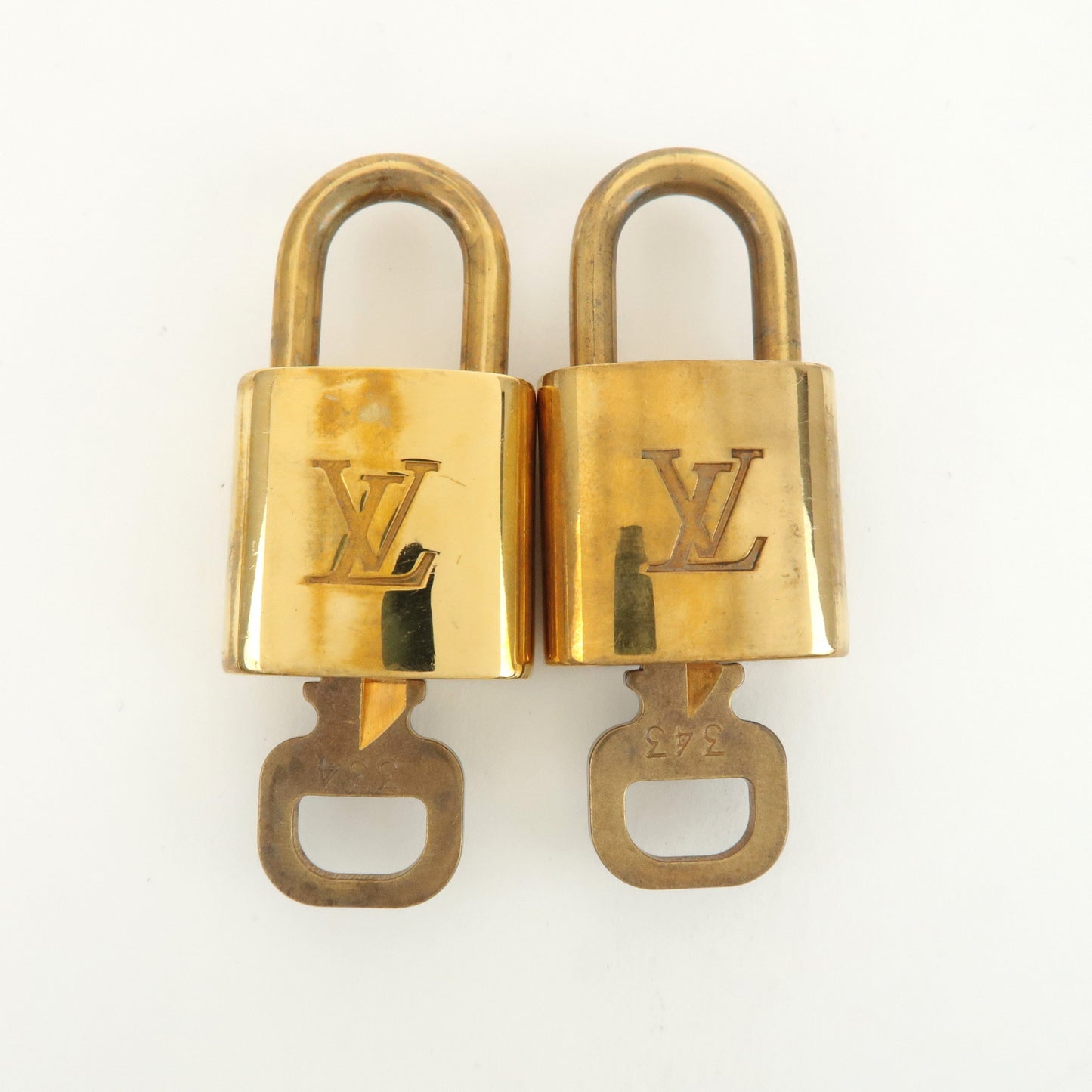 Louis Vuitton Set of 10 Lock & Key Cadena Key Lock Gold