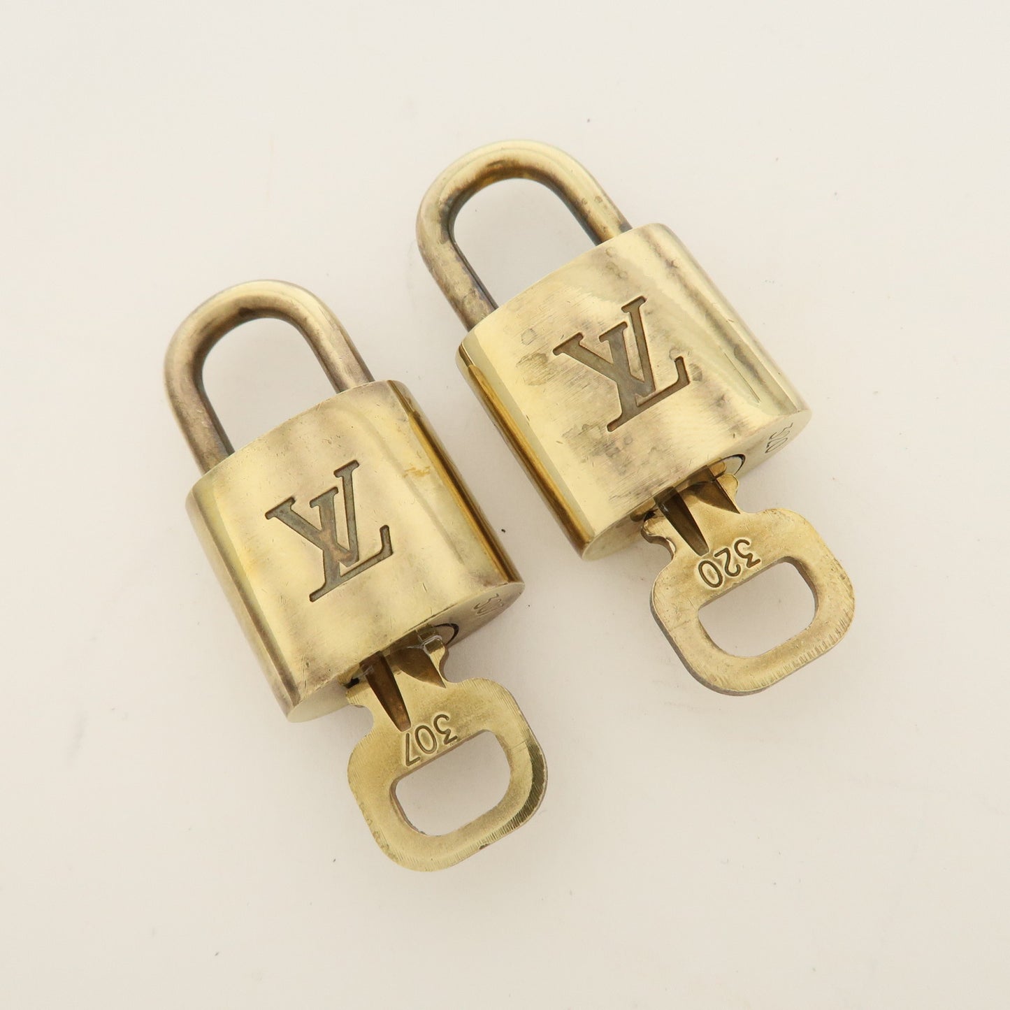 Louis Vuitton Set of 10 Lock & Key Cadena Key Lock Gold