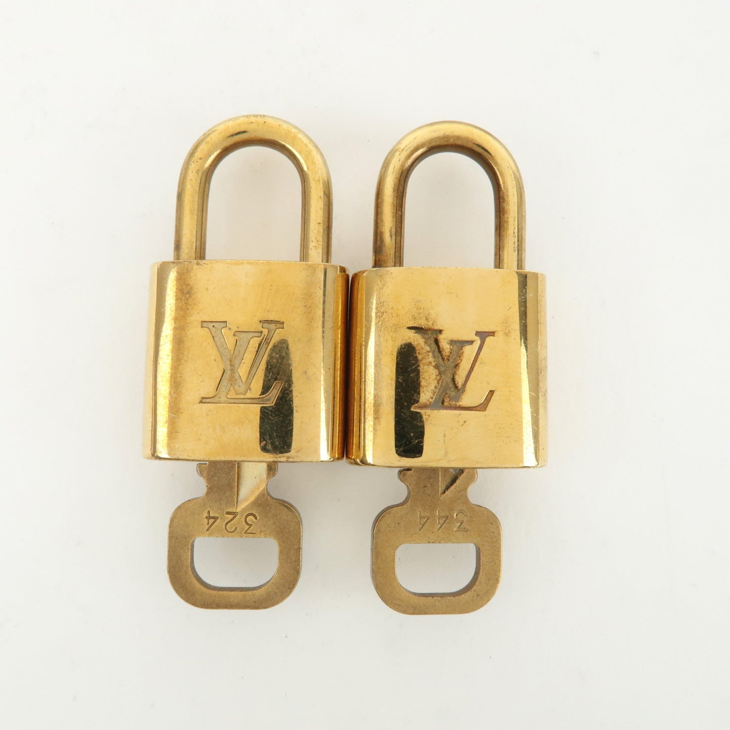 Louis Vuitton Set of 10 Lock & Key Cadena Key Lock Gold