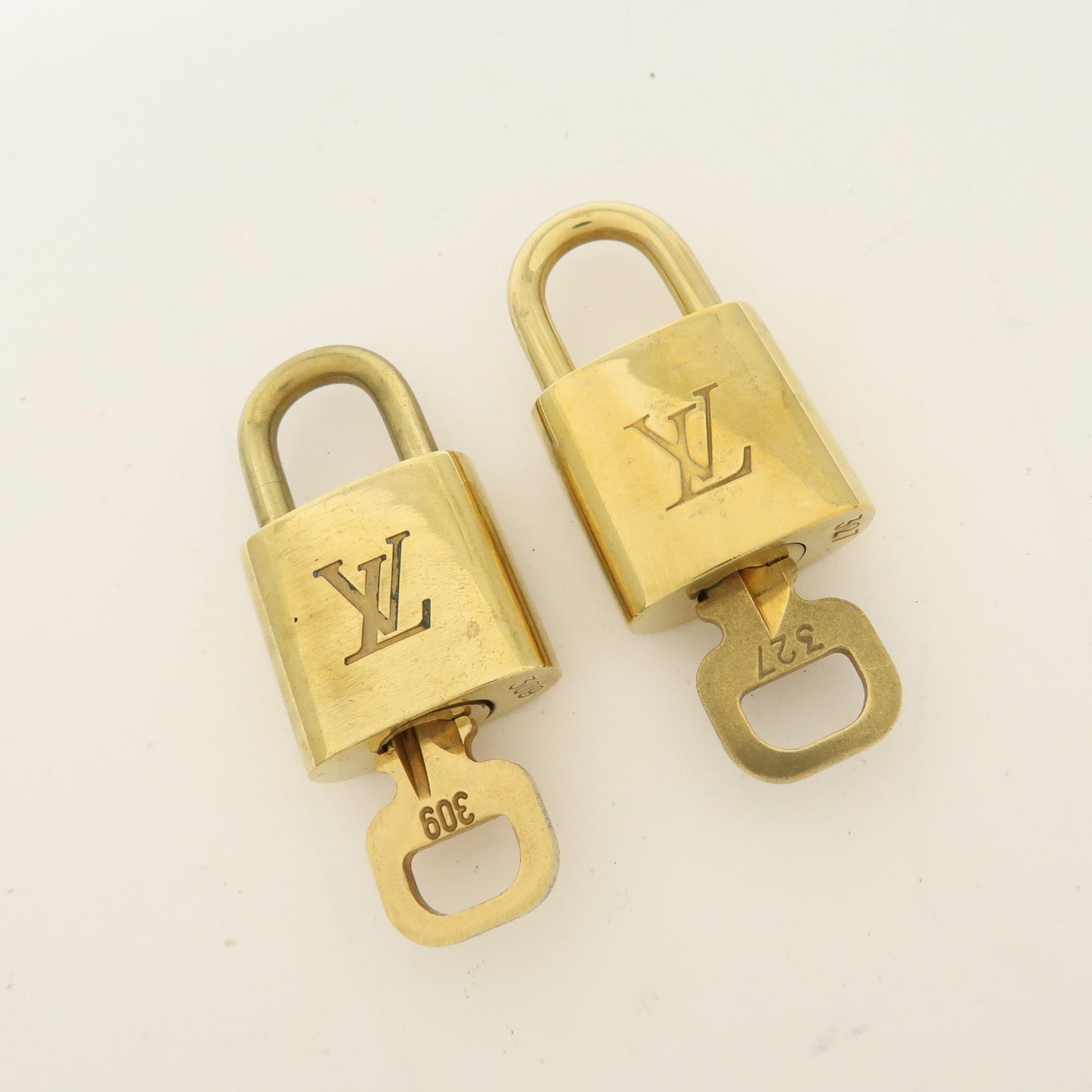 Louis Vuitton Set of 10 Lock & Key Cadena Key Lock Gold