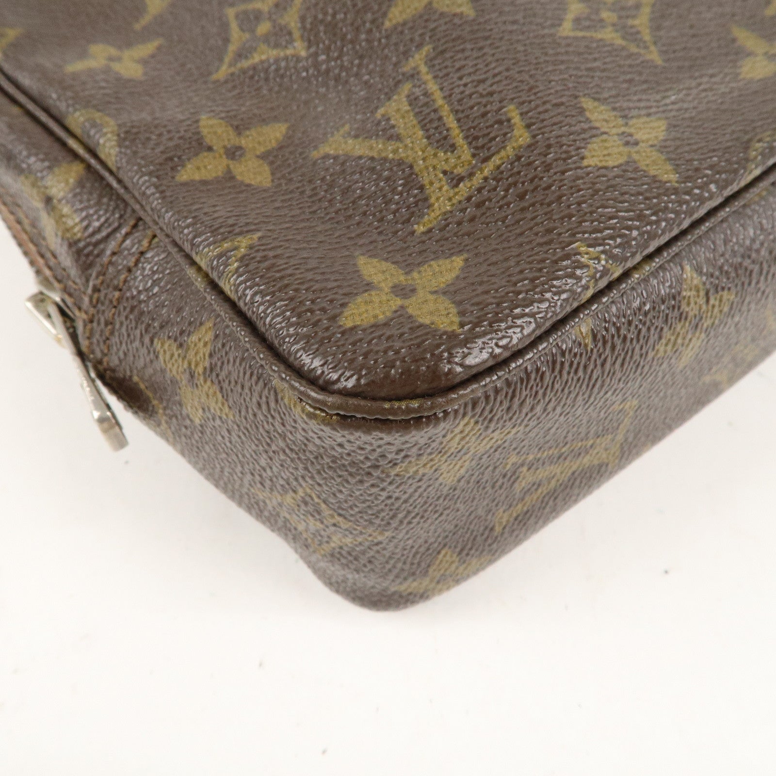 is Vuitton Monogram Trousse Toilette 23 Cosmetic Pouch M47524