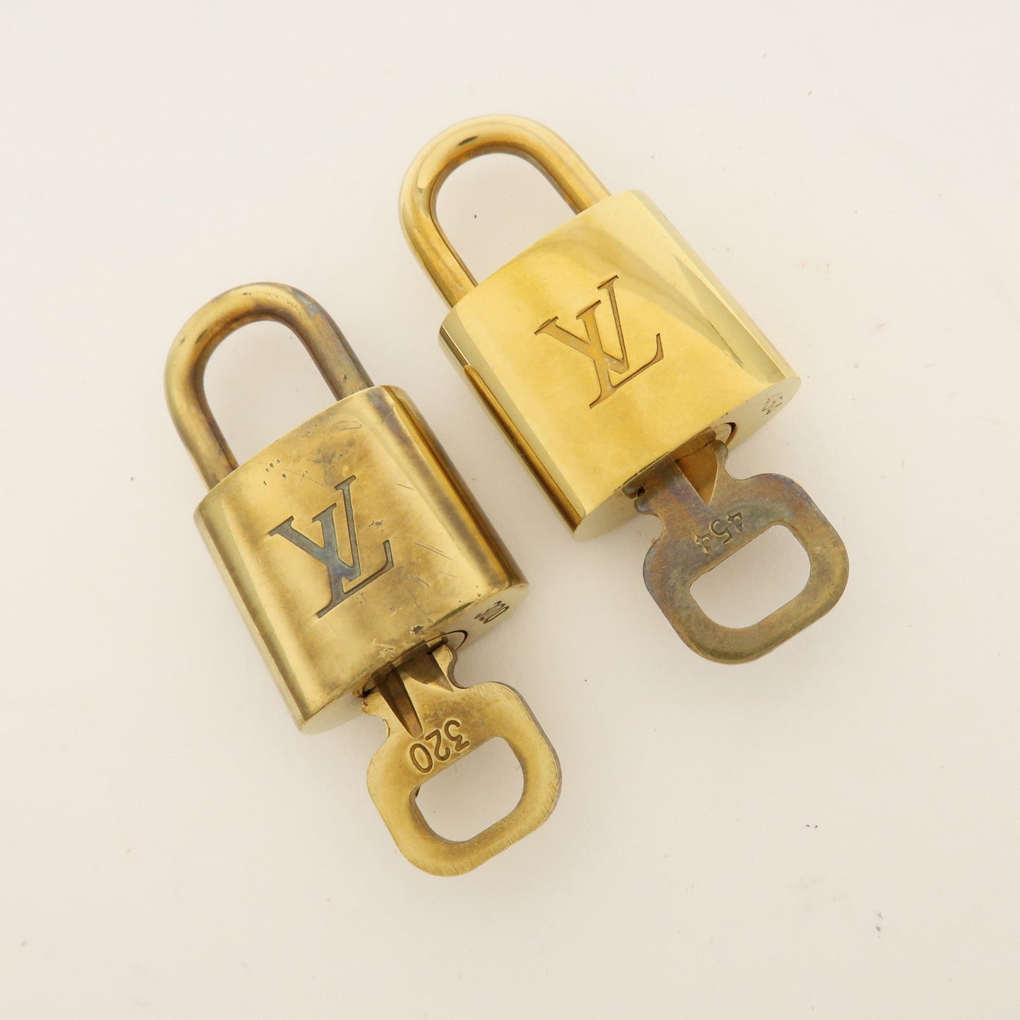 Louis Vuitton Set of 10 Lock & Key Cadena Key Lock Gold