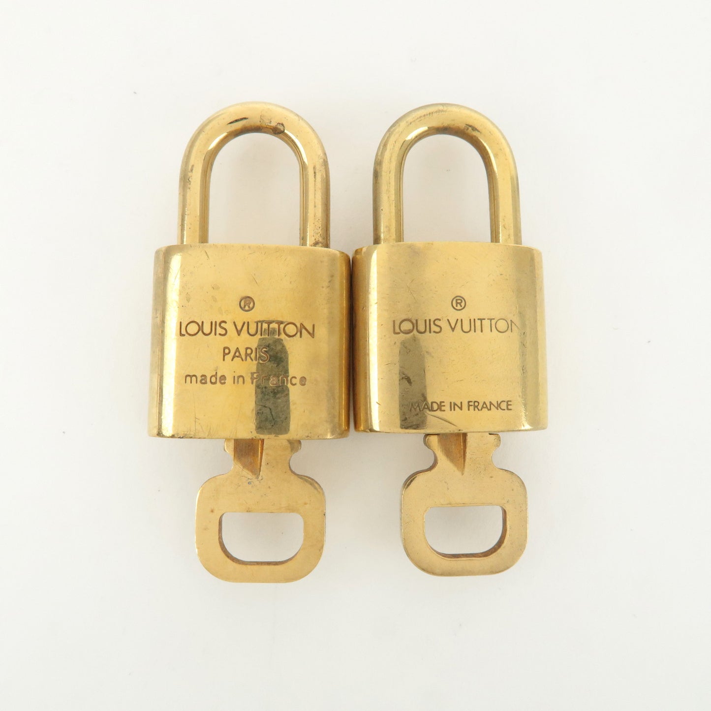 Louis Vuitton Set of 10 Lock & Key Cadena Key Lock Gold