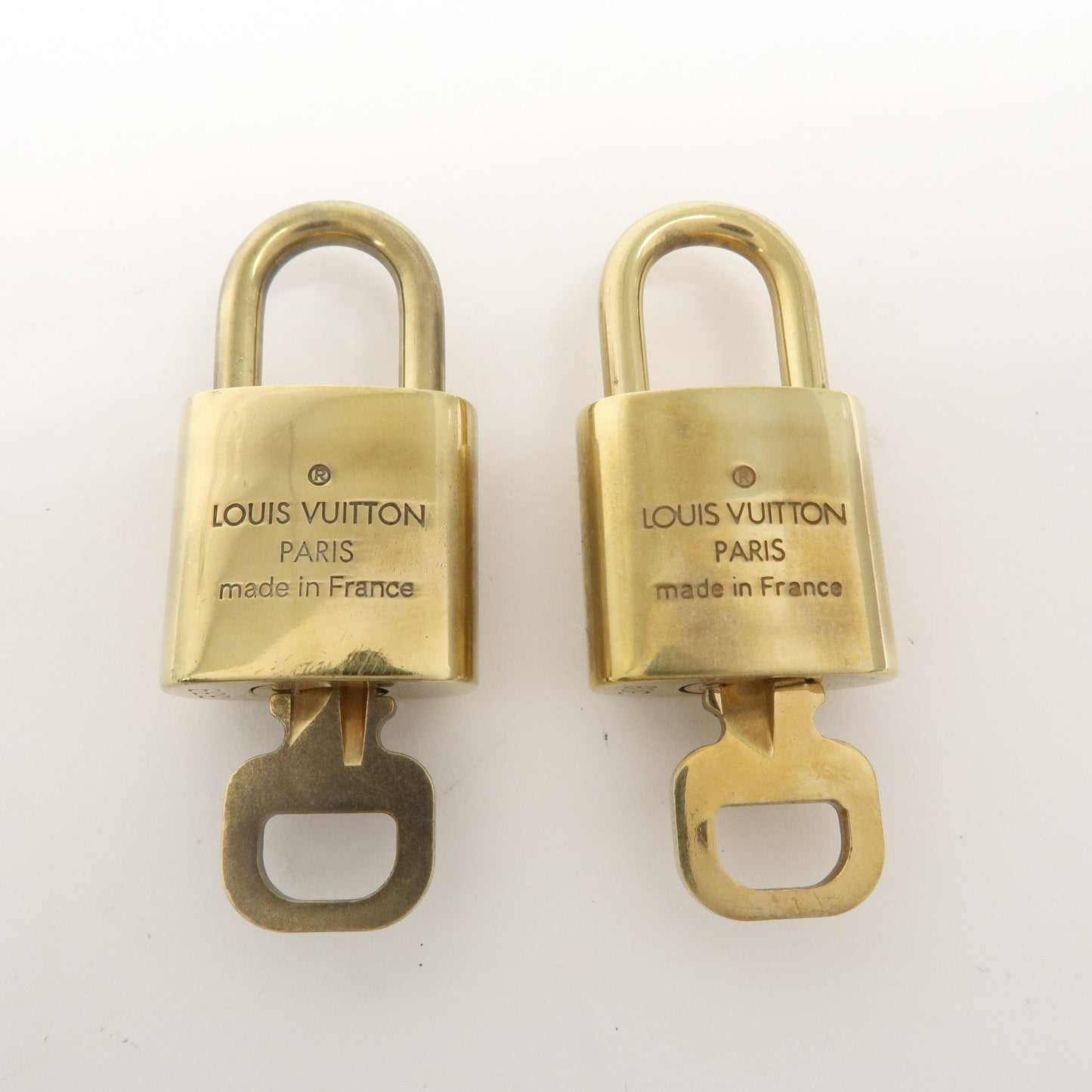 Louis Vuitton Set of 10 Lock & Key Cadena Key Lock Gold