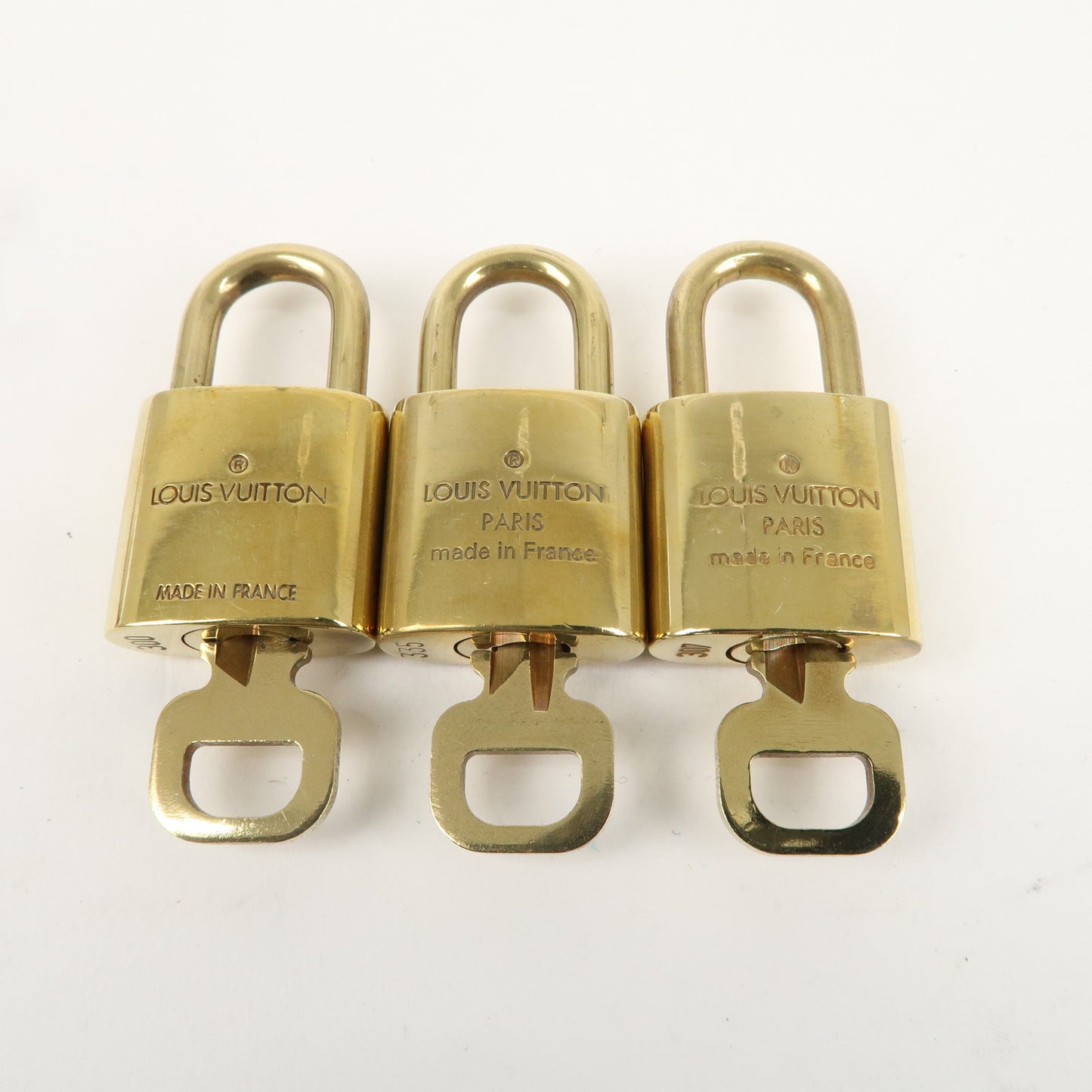 Louis Vuitton Set of 10 Lock & Key Cadena Key Lock Gold