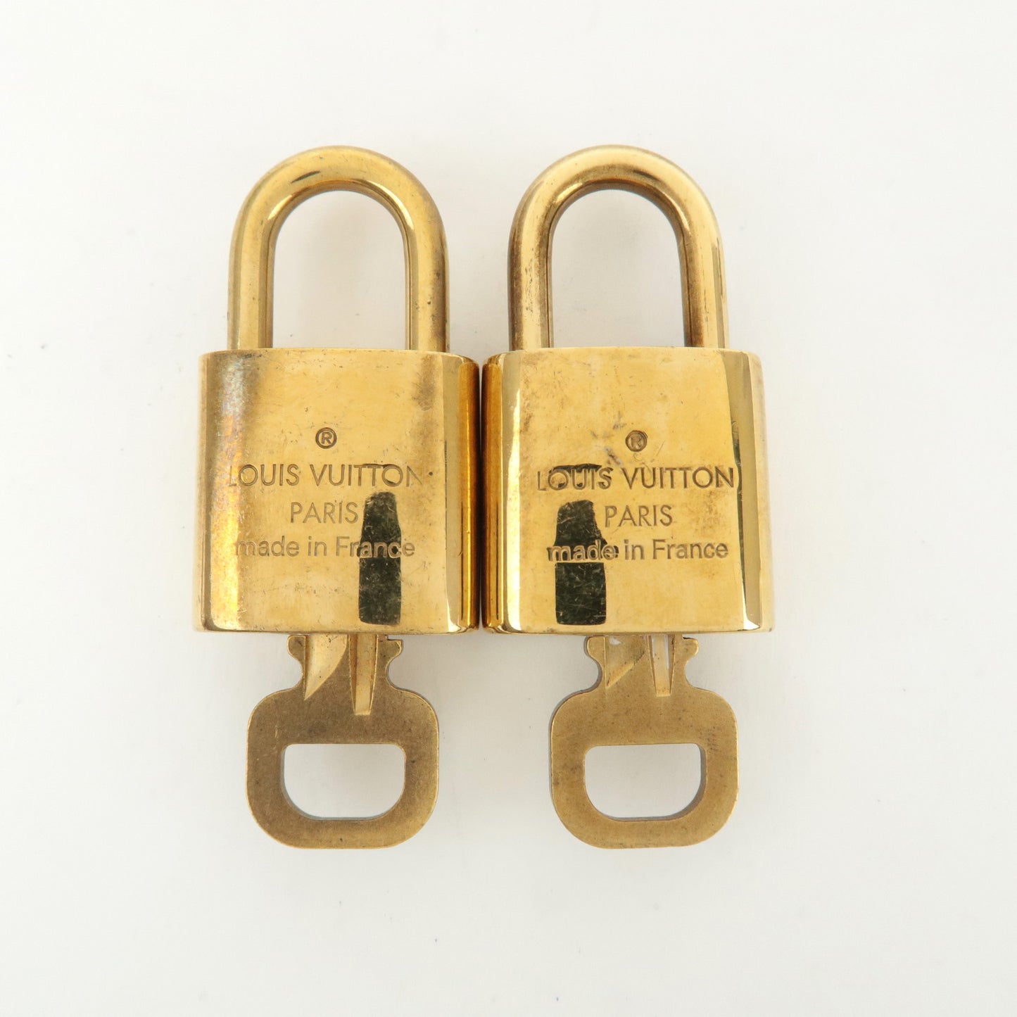 Louis Vuitton Set of 10 Lock & Key Cadena Key Lock Gold