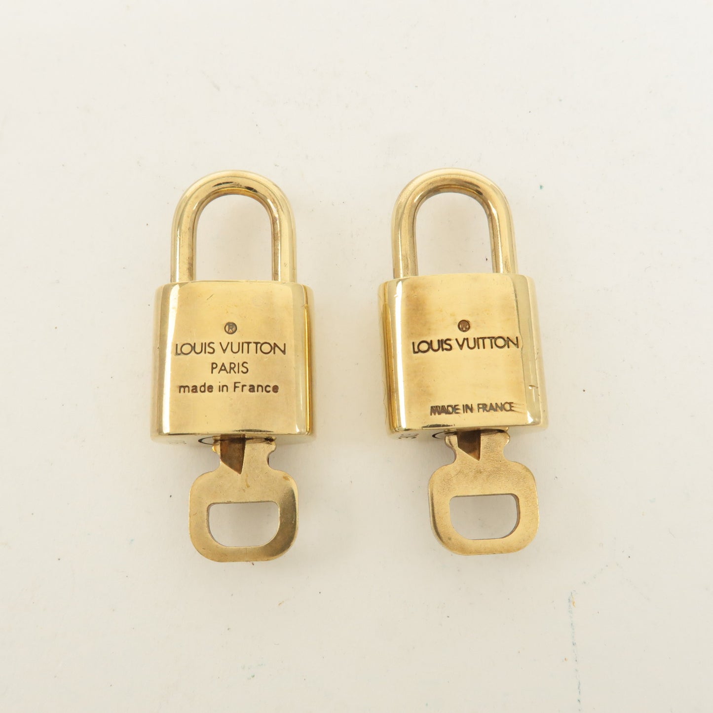 Louis Vuitton Set of 10 Lock & Key Cadena Key Lock Gold