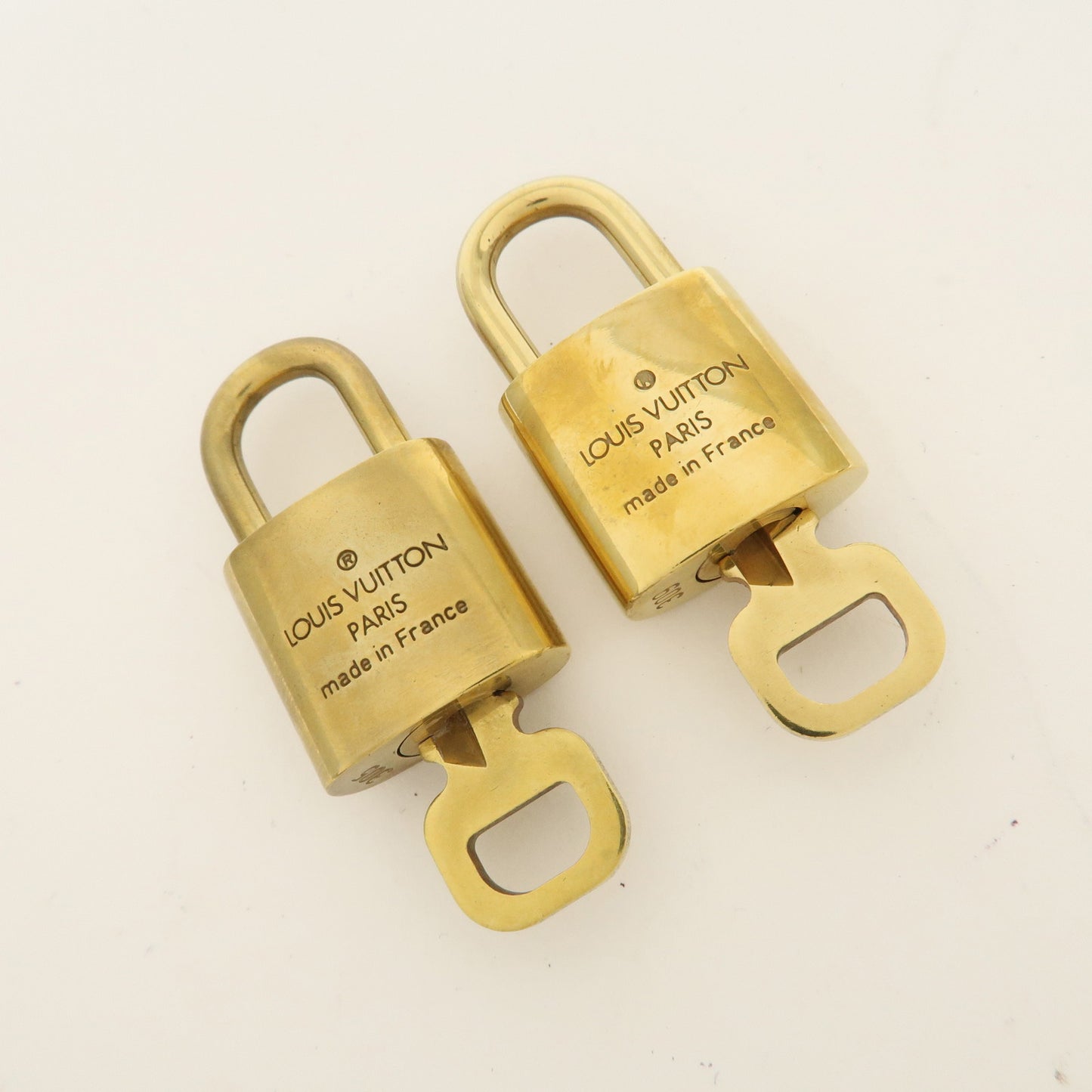 Louis Vuitton Set of 10 Lock & Key Cadena Key Lock Gold