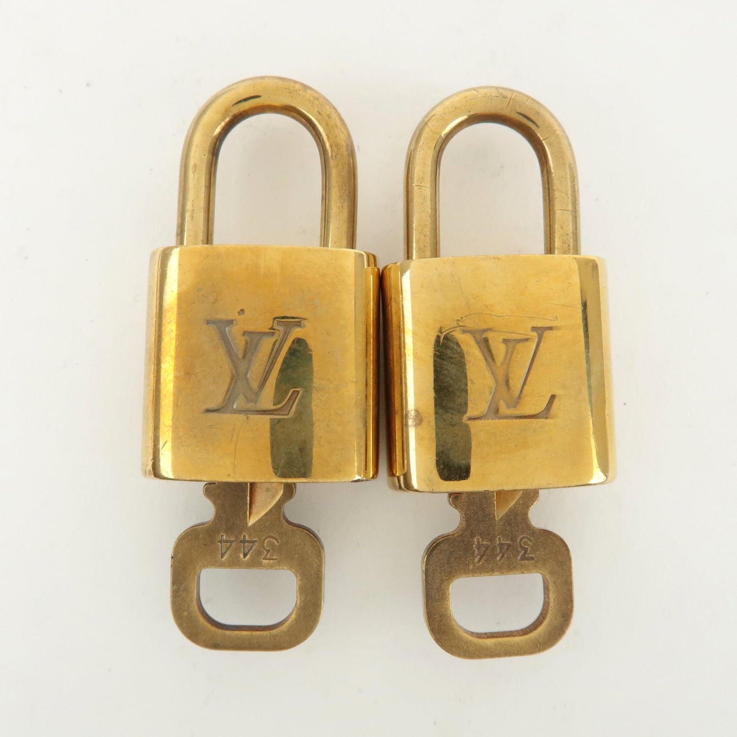 Louis Vuitton Set of 10 Lock & Key Cadena Key Lock Gold