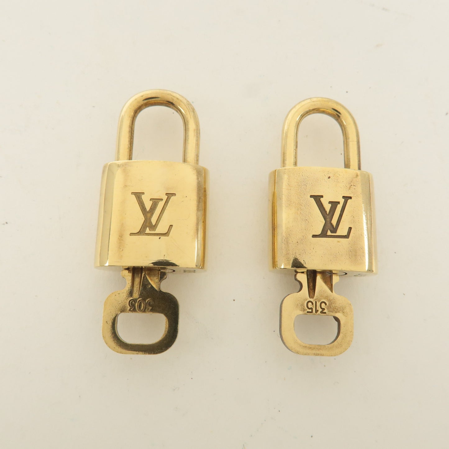 Louis Vuitton Set of 10 Lock & Key Cadena Key Lock Gold