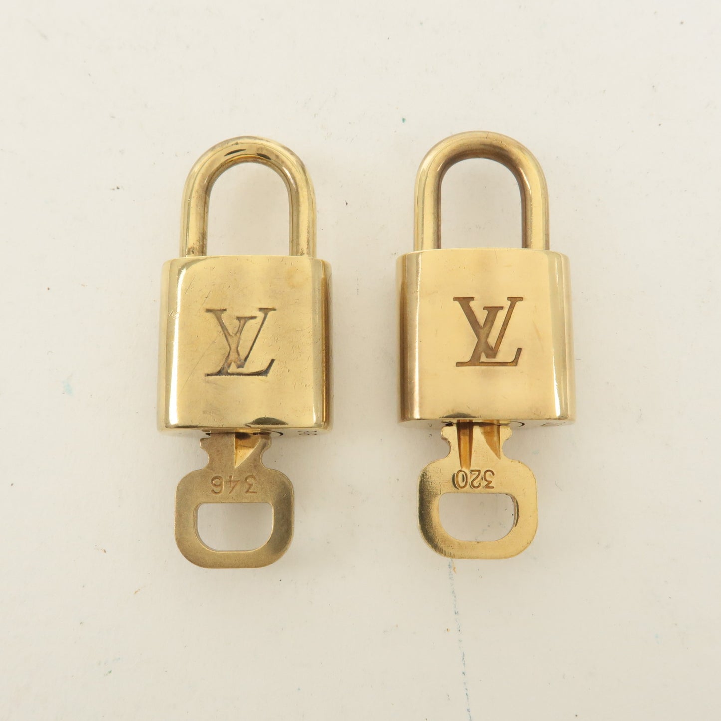 Louis Vuitton Set of 10 Lock & Key Cadena Key Lock Gold