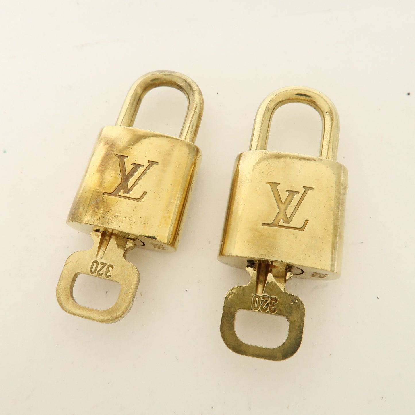 Louis Vuitton Set of 10 Lock & Key Cadena Key Lock Gold