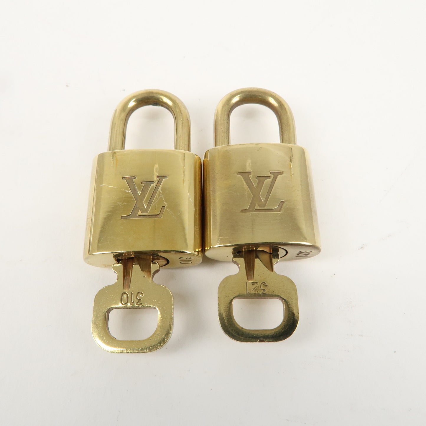 Louis Vuitton Set of 10 Lock & Key Cadena Key Lock Gold