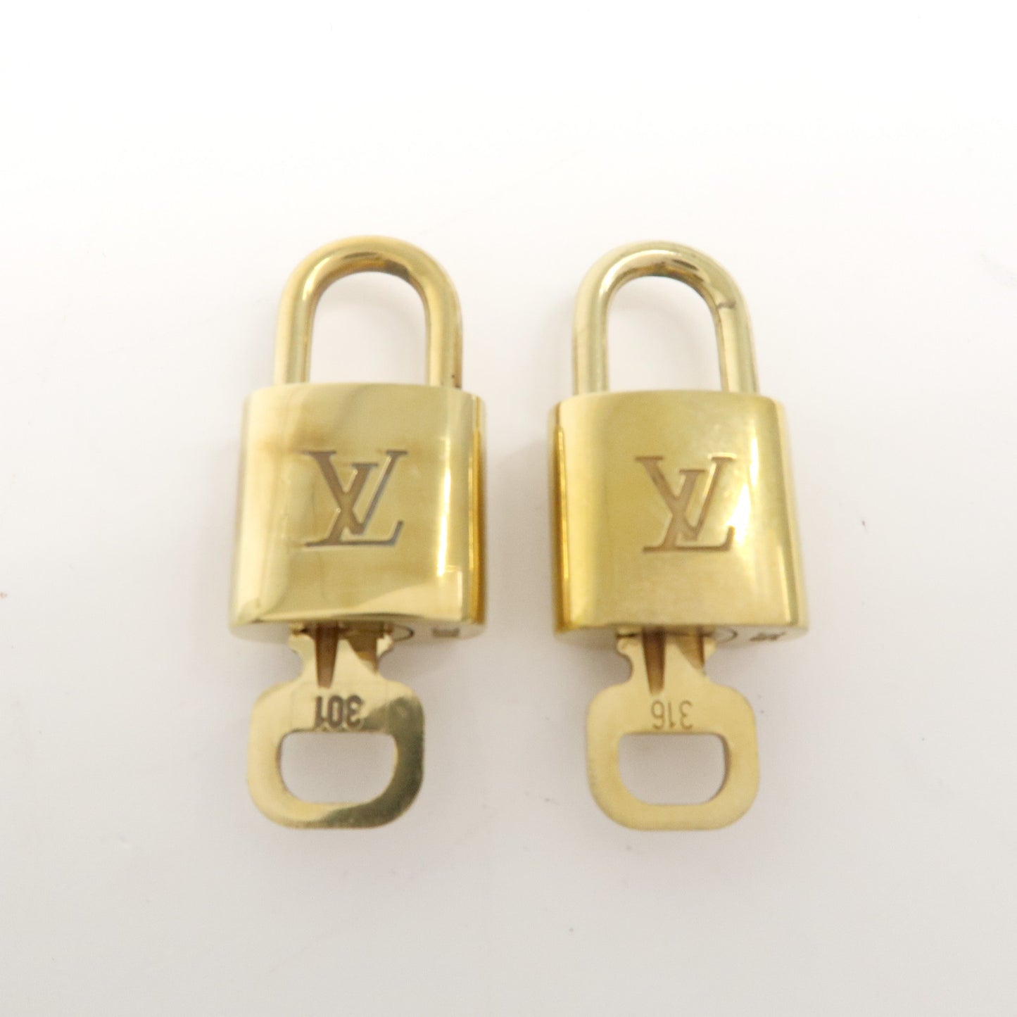 Louis Vuitton Set of 10 Lock & Key Cadena Key Lock Gold