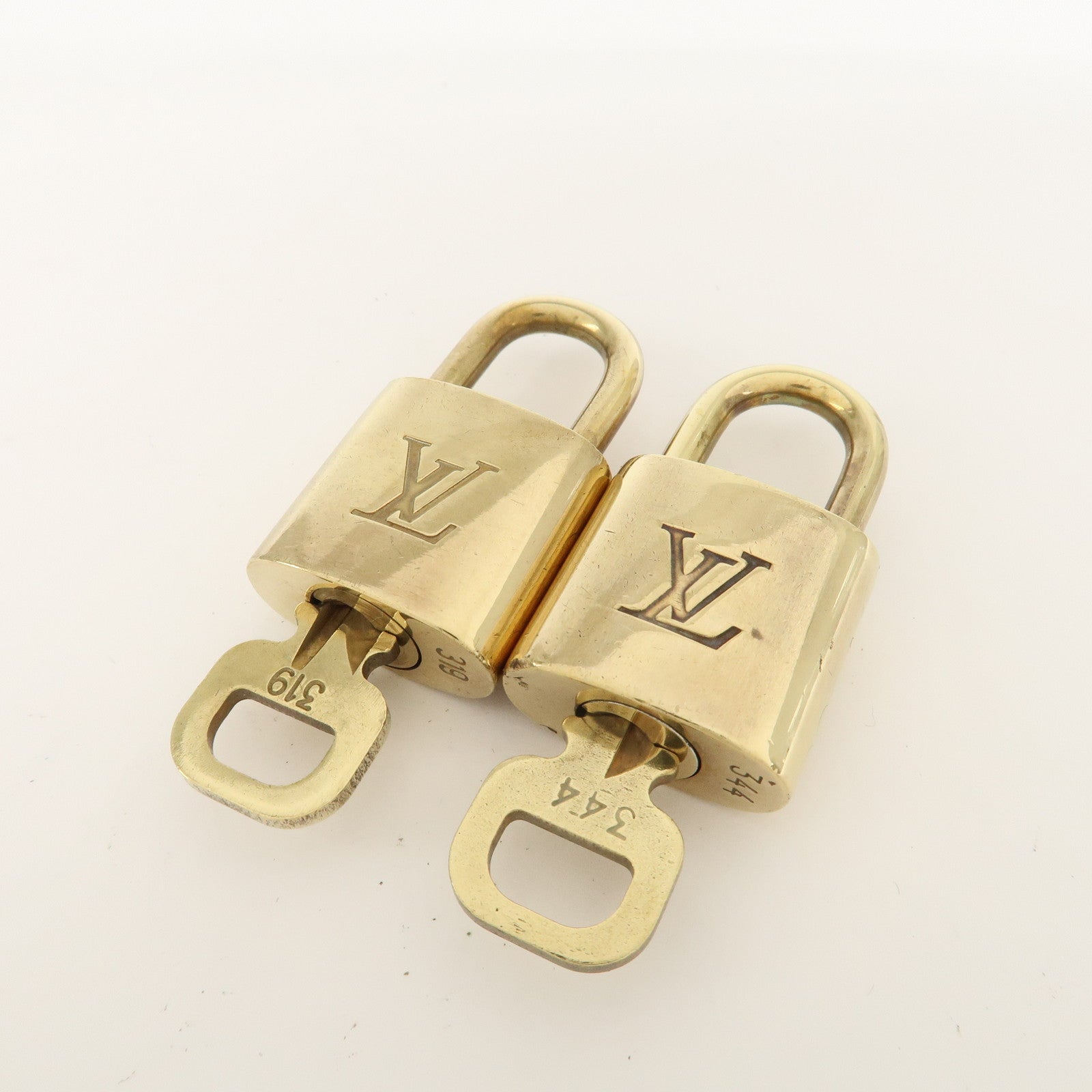 Louis Vuitton Set of 10 Lock & Key Cadena Key Lock Metal Gold