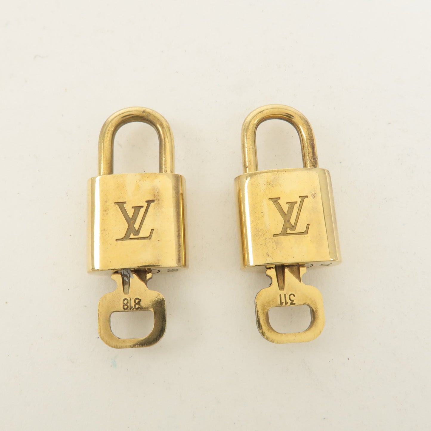 Louis Vuitton Set of 10 Lock & Key Cadena Key Lock Gold