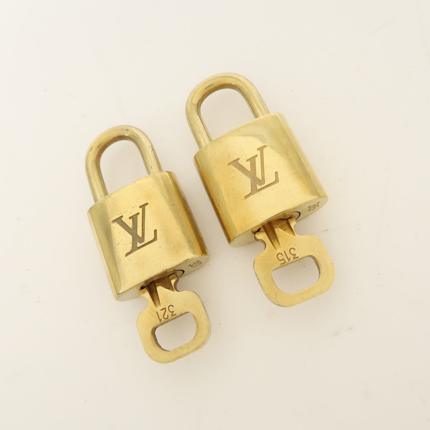 Louis Vuitton Set of 10 Lock & Key Cadena Key Lock Gold