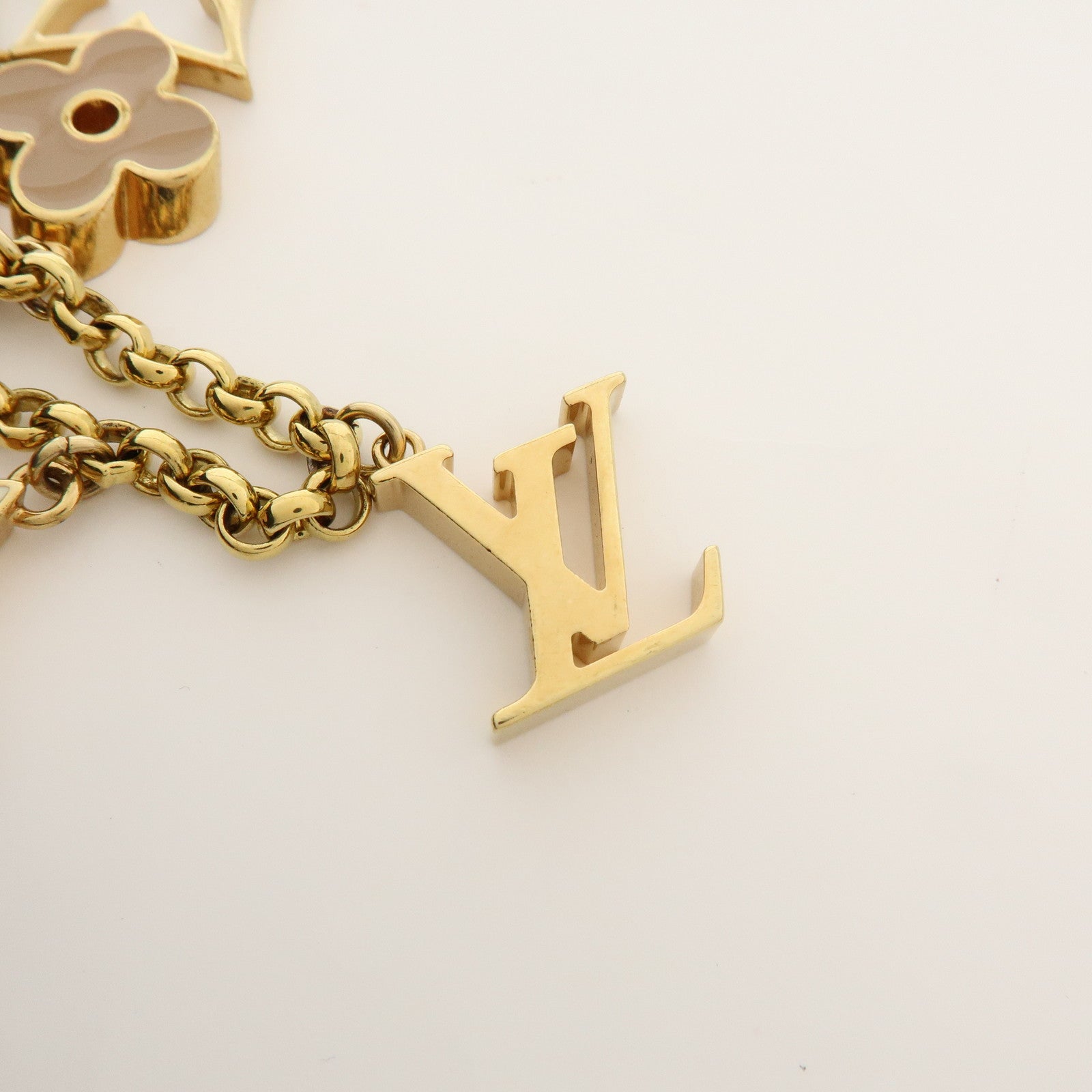 Louis Vuitton Fleur de Monogram Bag Charm Key Chain Gold M65111