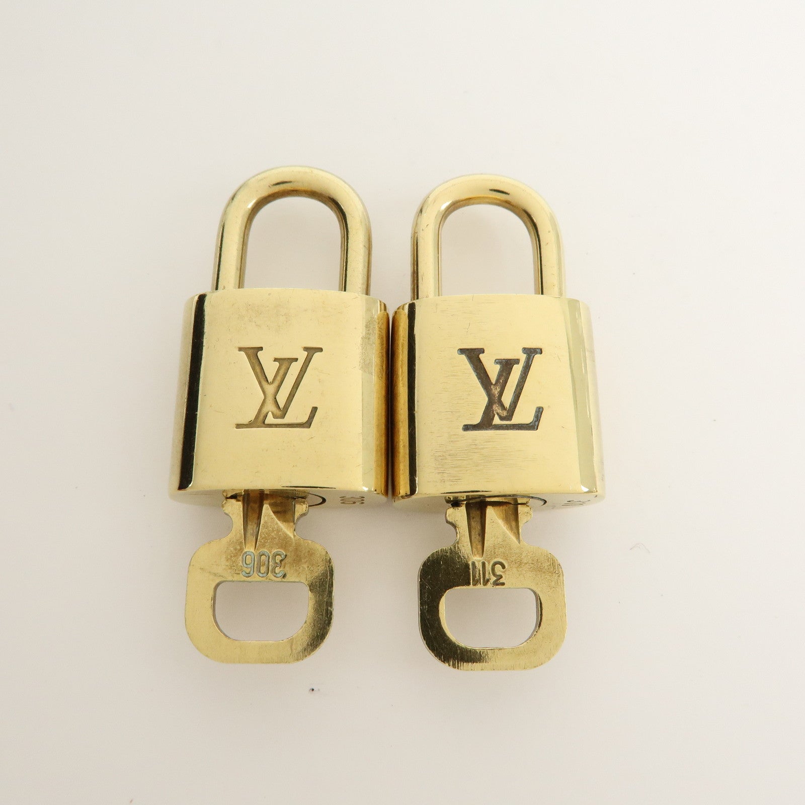 Louis Vuitton Set of 10 Lock & Key Cadena Key Lock Gold